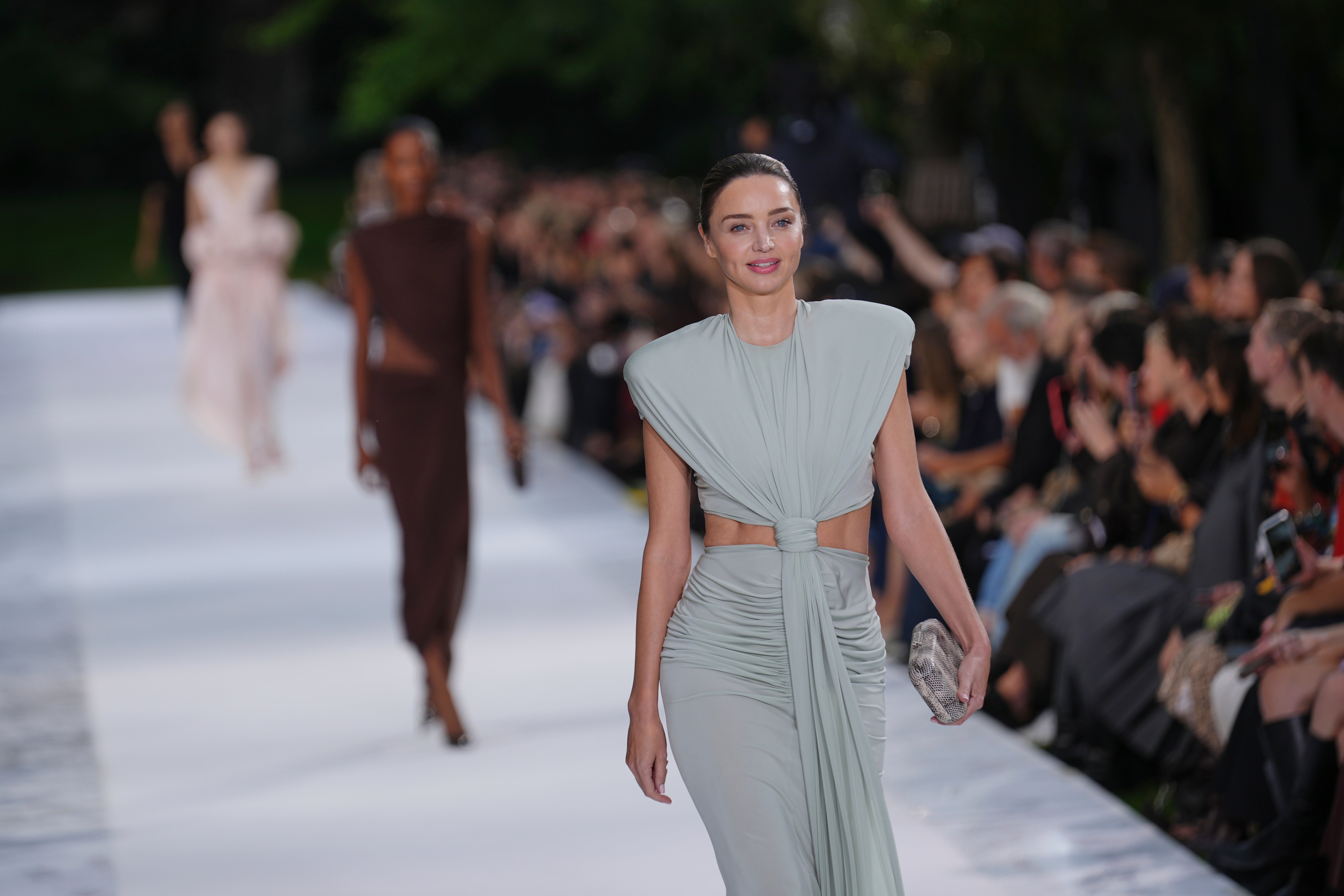 Miranda Kerr showcasing the drapery Stella McCartney employed in her evening wear (Aurelien Morissard/AP) (AP)