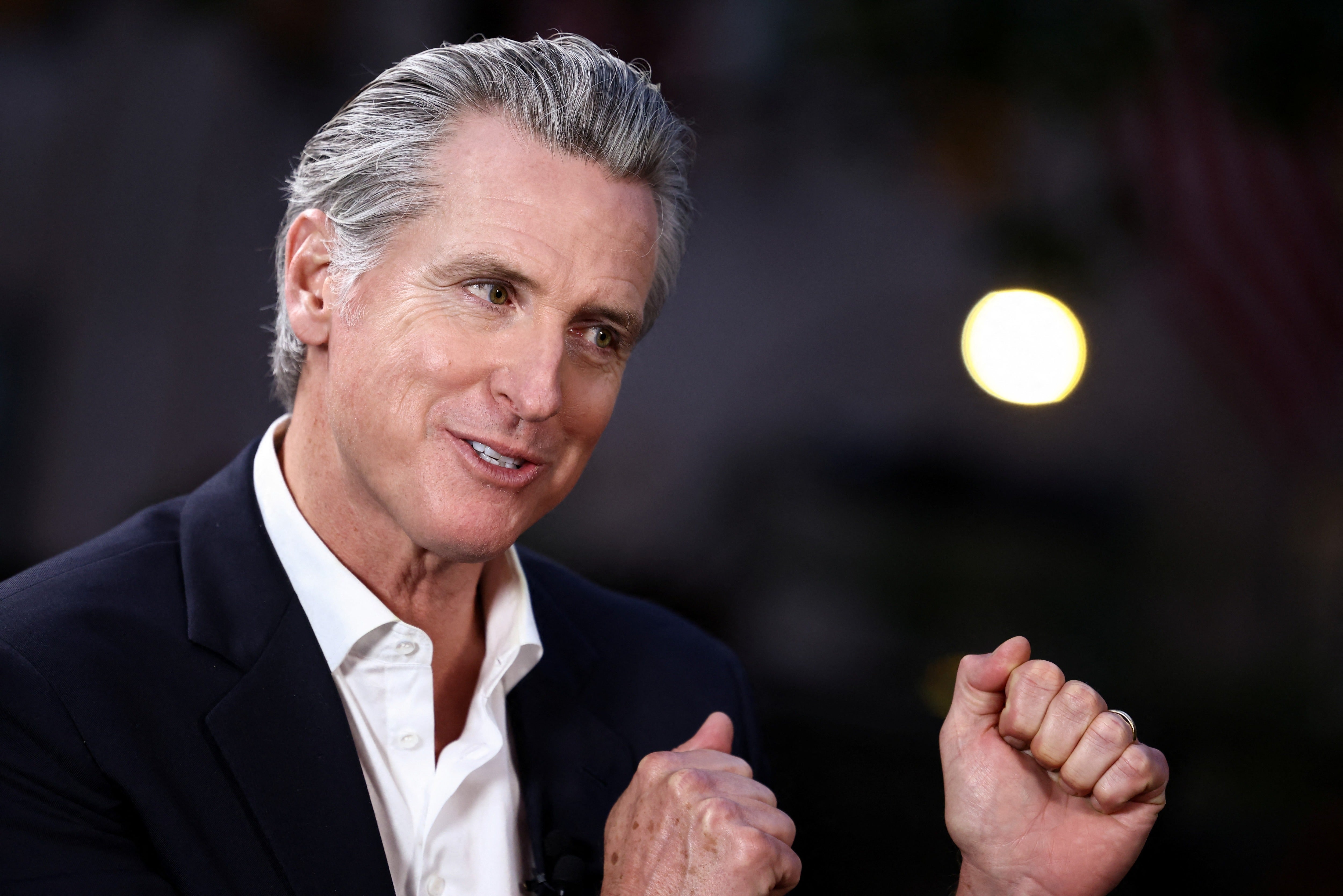 California Governor Gavin Newsom has added fuel to his feud with podcaster Joe Rogan, calling him a 'bull**** artist' and claiming that he is too scared to have him join his show