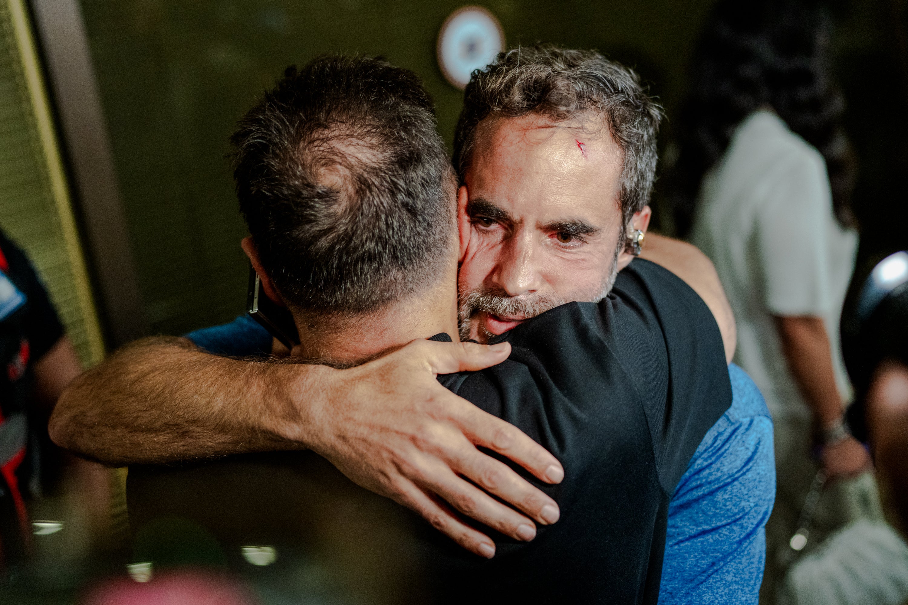 Passengers reunited with their families at Ben Gurion airport later on Wednesday