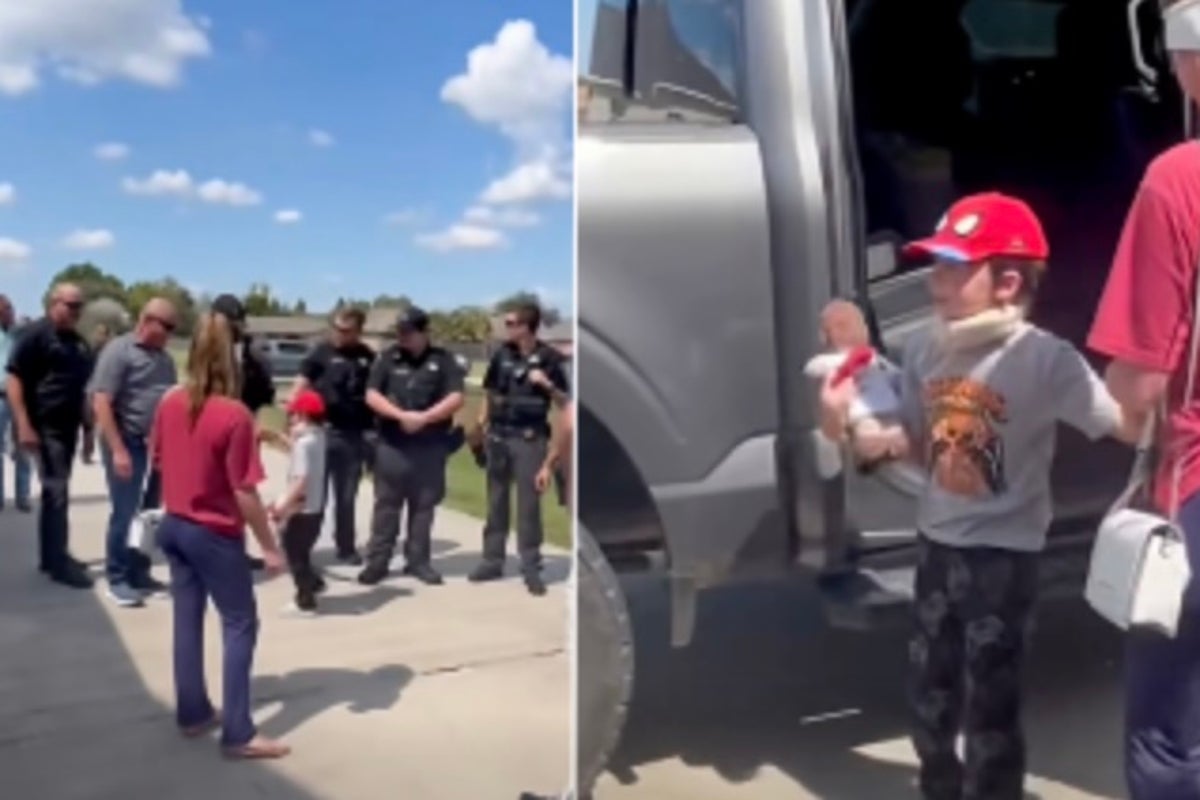 Heartwarming moment boy who survived stabbing attack that left four dead returns home