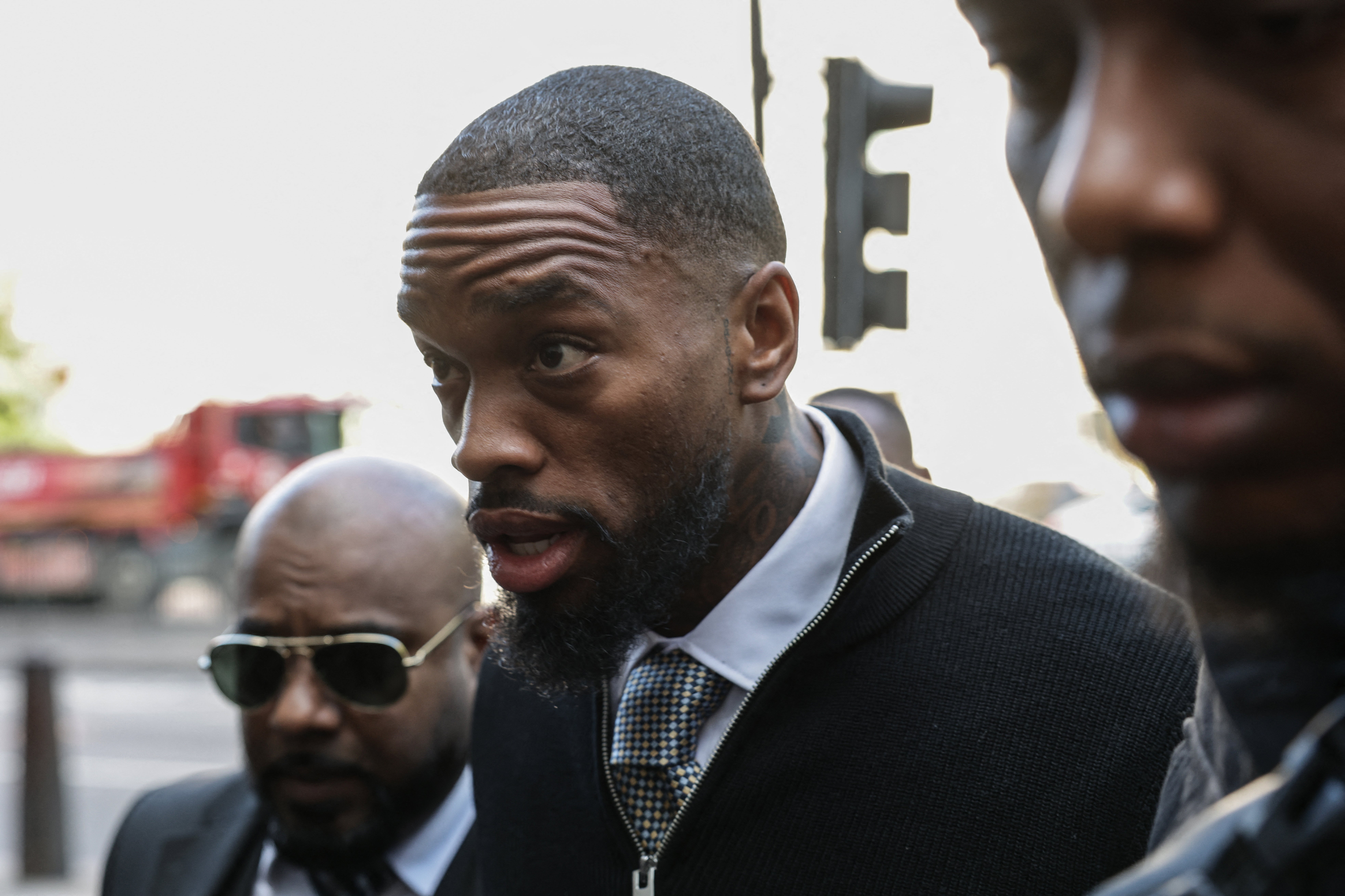 England footballer Ivan Toney was flanked by three members of his entourage as he arrived at Westminster Magistrates’ Court (AFP/Getty)