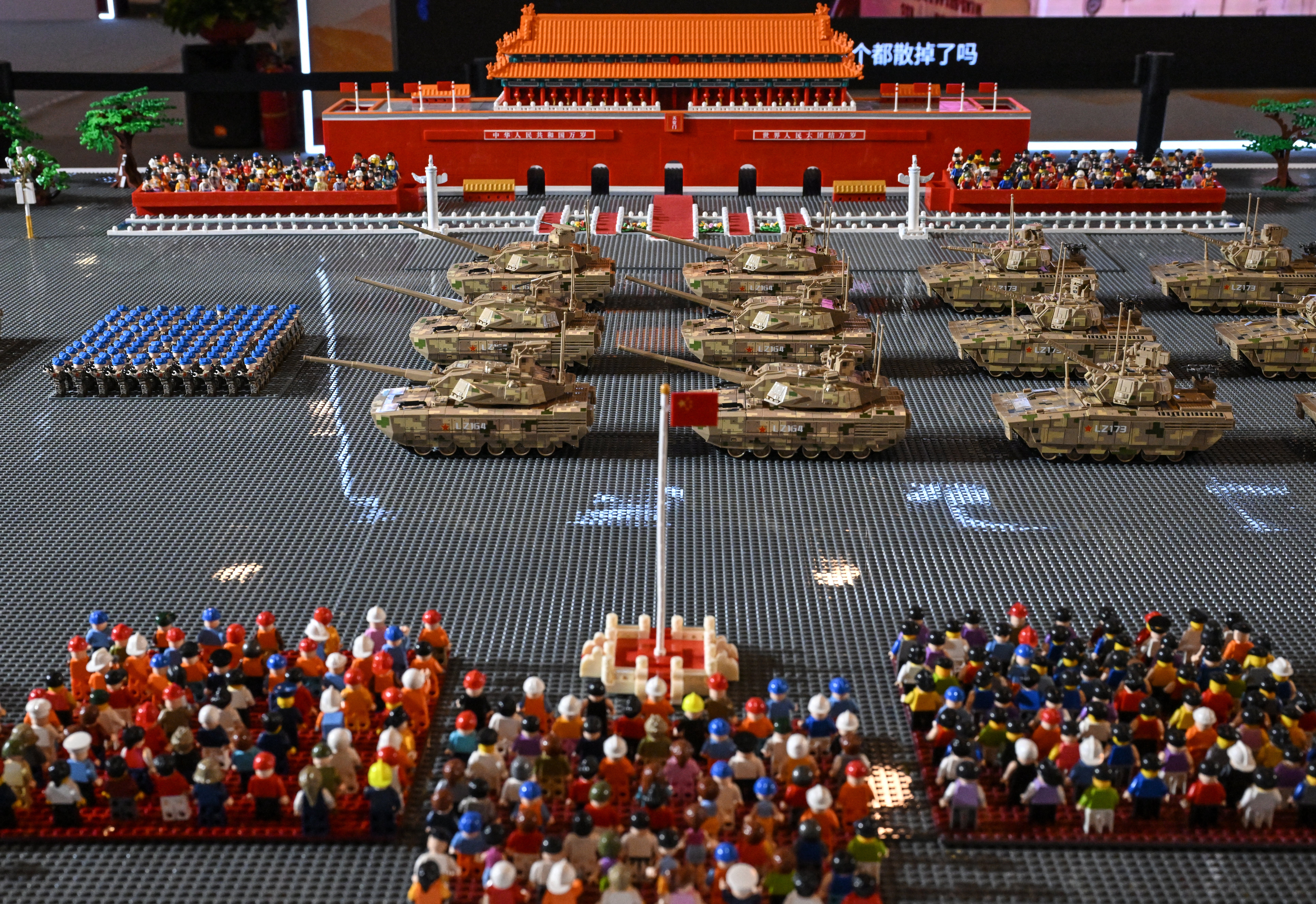 This picture shows a recreation of China's grand military parade made with toys during the 14th China International Defence Electronics Exhibition