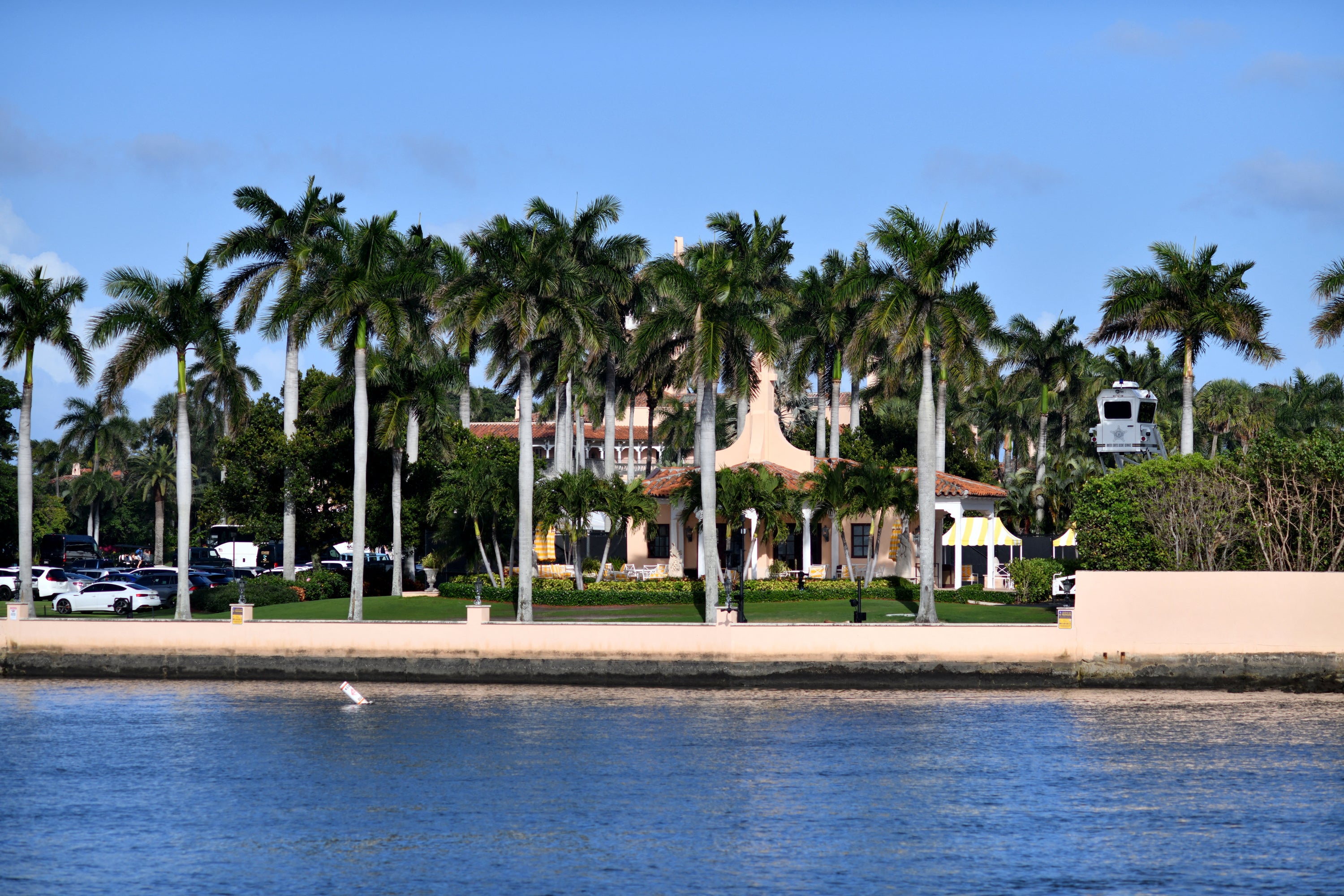 In addition to this trips to California and abroad, Paxton is a regular fixture at Trump's home at Mar-a-Lago in Florida (AFP/Getty)