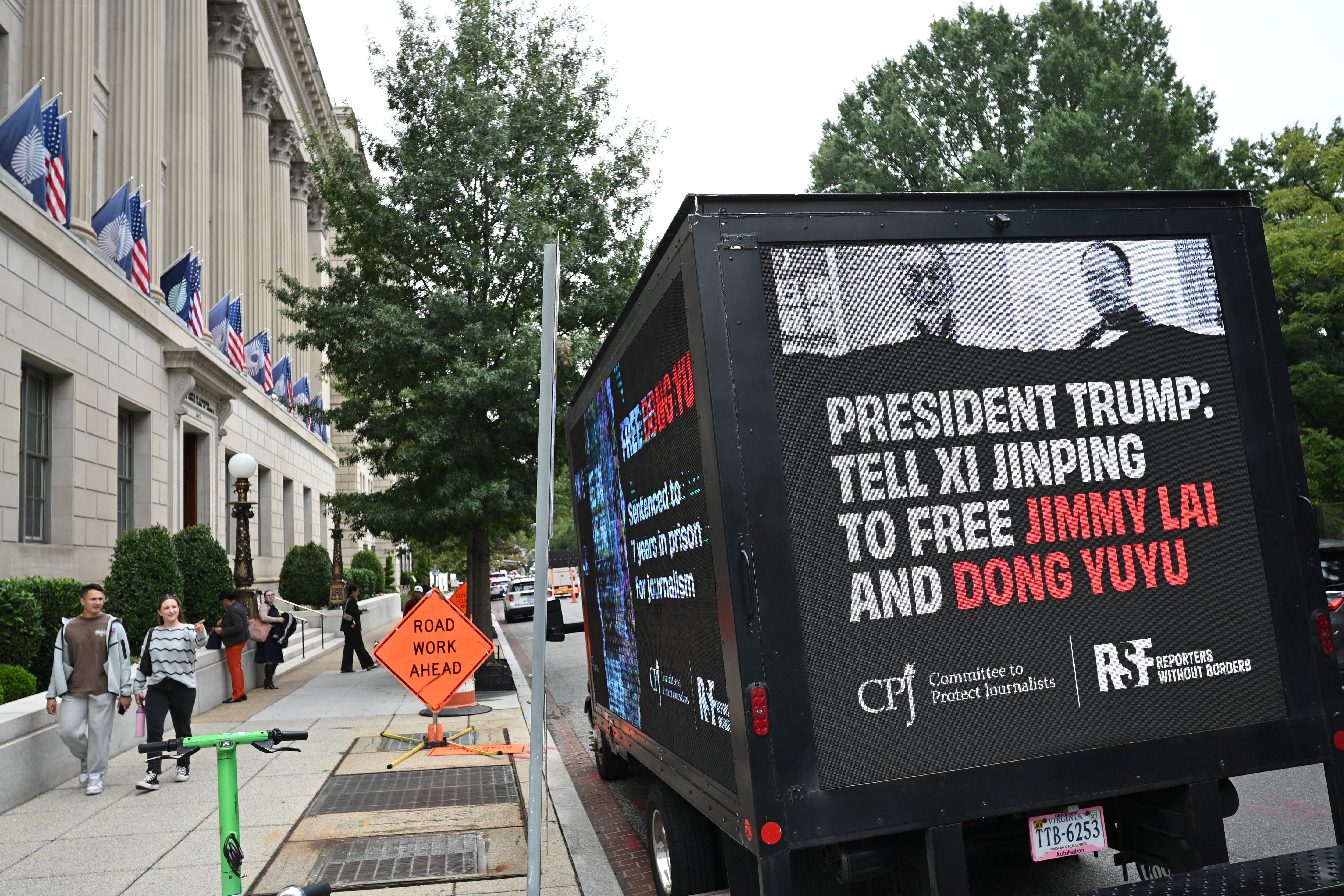 A display calls for the release of Chinese journalist Dong Yuyu and Hong Kong publisher Jimmy Lai near the White House in Washington (AFP/Getty)