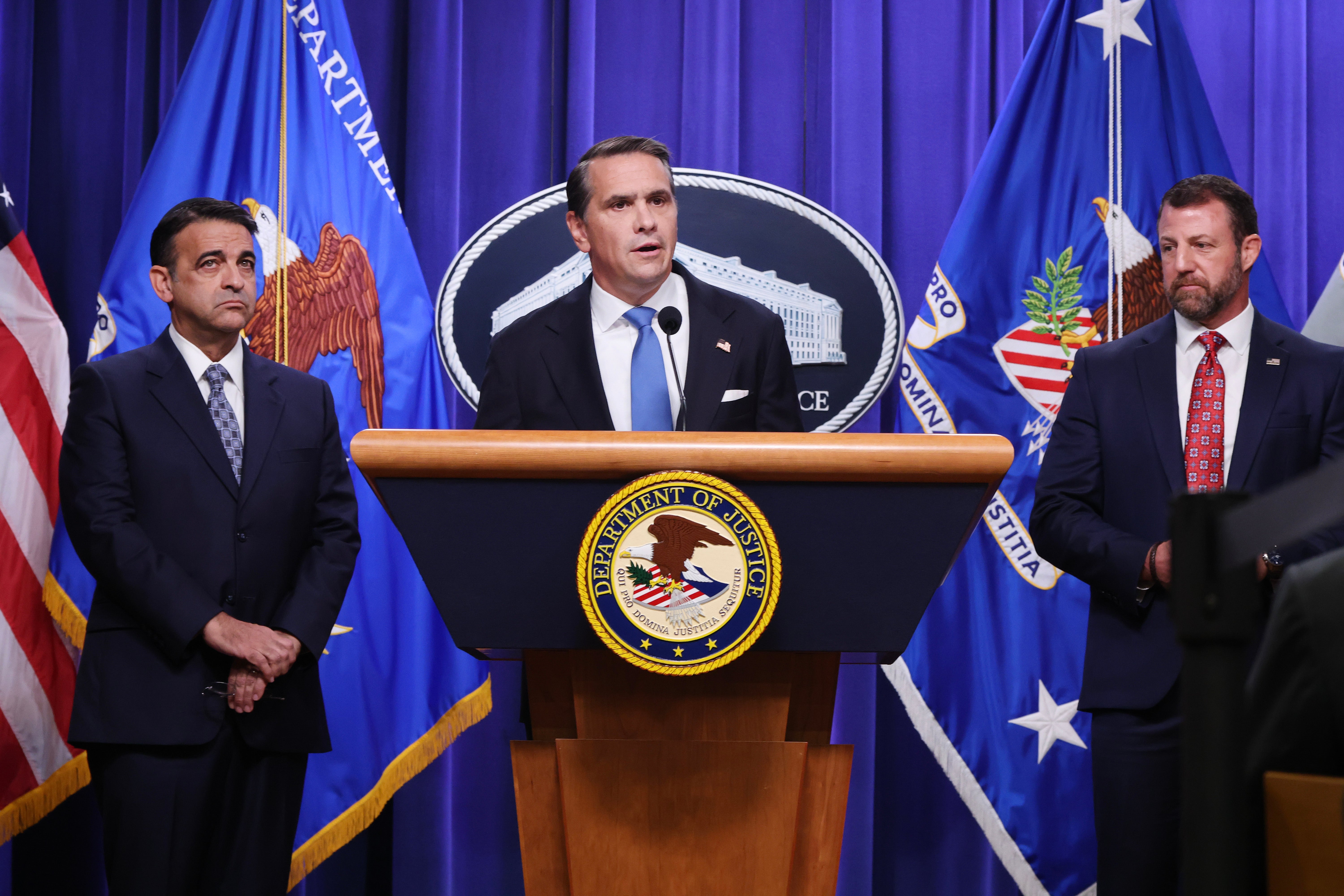 Secretary of Homeland Security Markwayne Mullin (right) said that there is no 'credible threat' to the US. Attorney General Todd Blanche (center) says that the US is coordinating with Israel