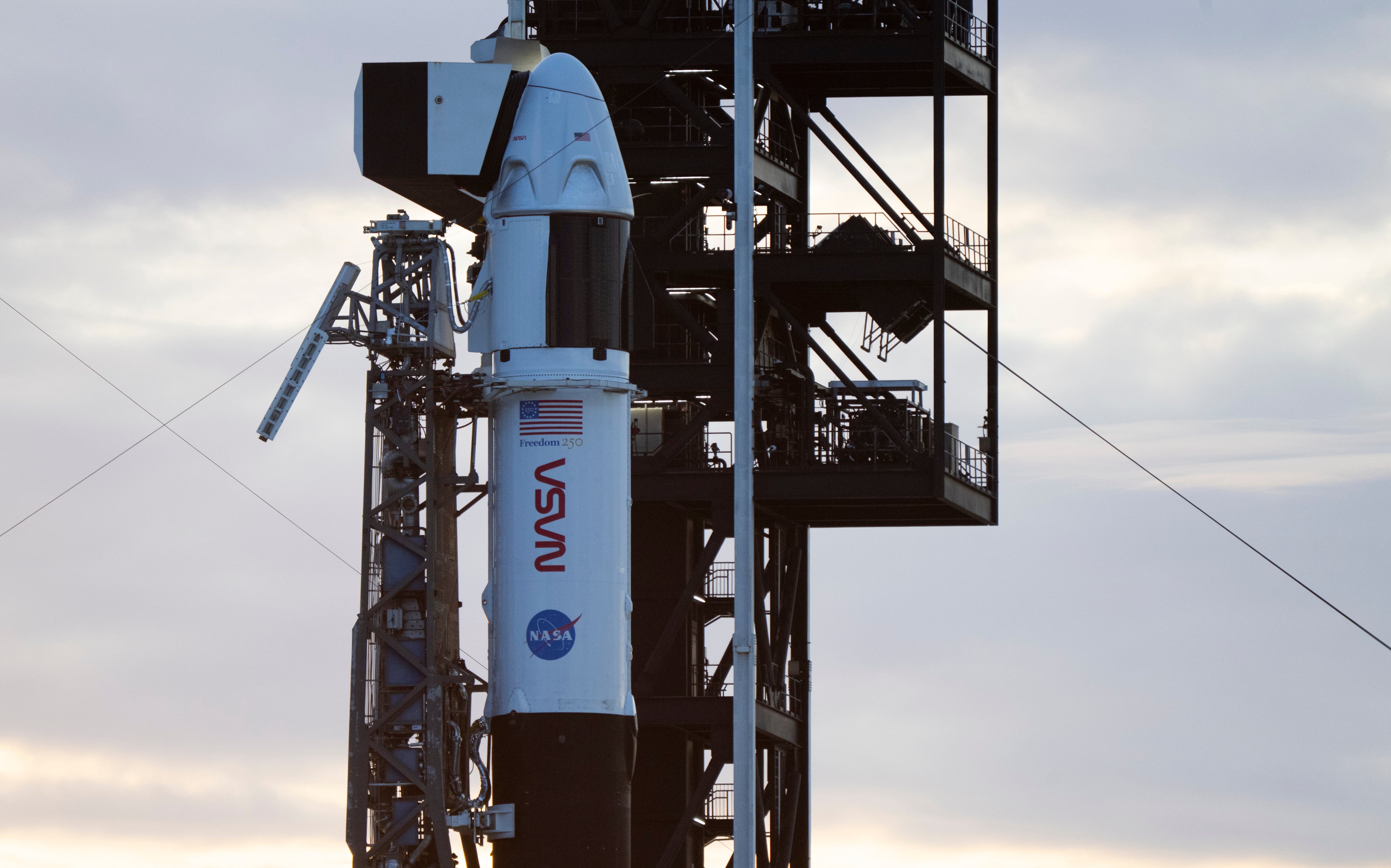 A SpaceX Falcon 9 rocket with the company's Dragon spacecraft on top at Cape Canaveral Space Force Station in Florida on 30 September ahead of the Crew-13 mission (Getty)
