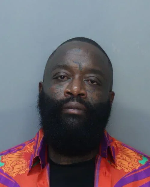 Rick Ross’ mug shot after being booked into jail on battery charges in Miami Beach
