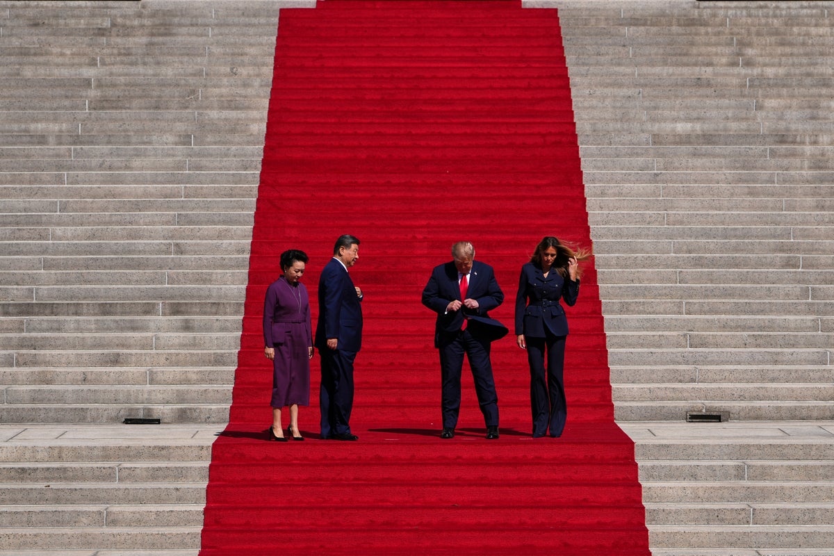 11 minutes on the steps: How an AP photographer framed Trump and Xi’s red-carpet shot