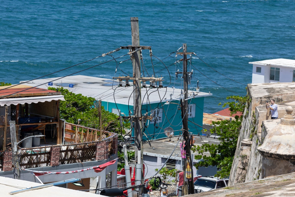 Puerto Rico sets record electric rate as outages persist