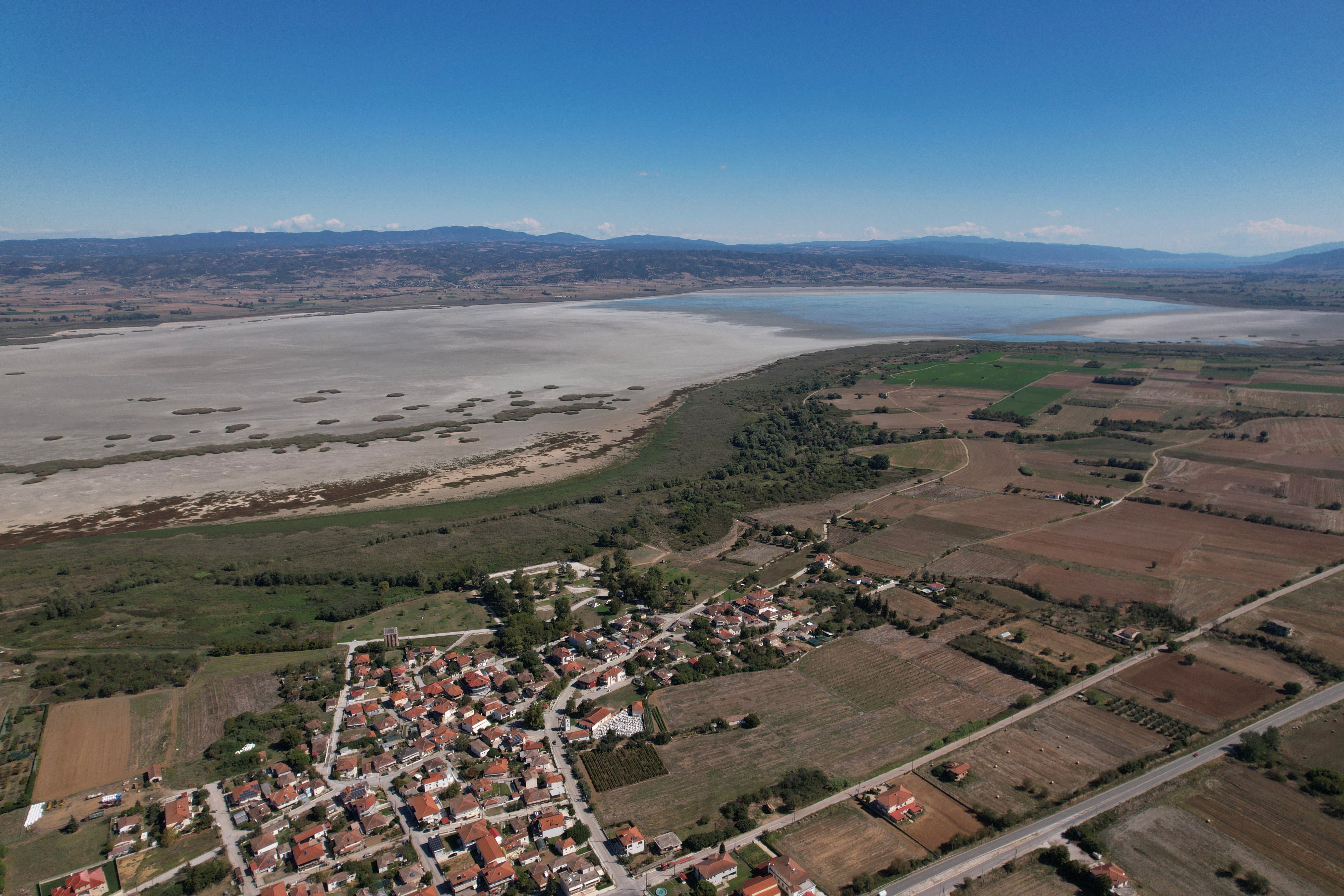 The village of Agios Vasileios at the banks of the dried-up Lake Koroneia