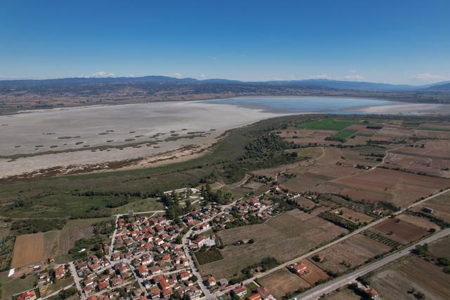 The village of Agios Vasileios at the banks of the dried-up Lake Koroneia