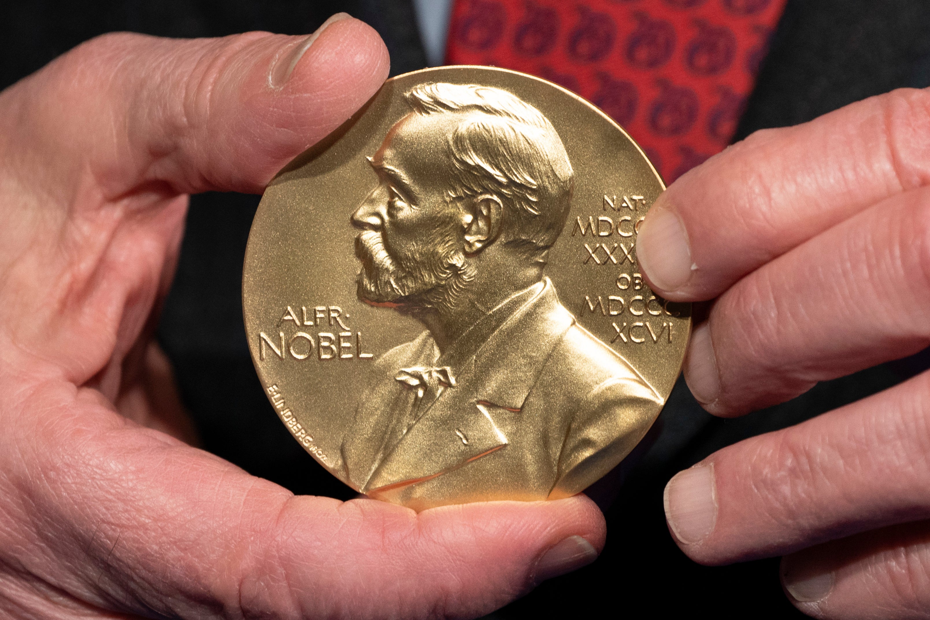 A close-up view of a Nobel Prize medal at the National Institutes of Health (NIH) in Bethesda, Md., Dec. 8, 2020. (AP Photo/Jacquelyn Martin, File)