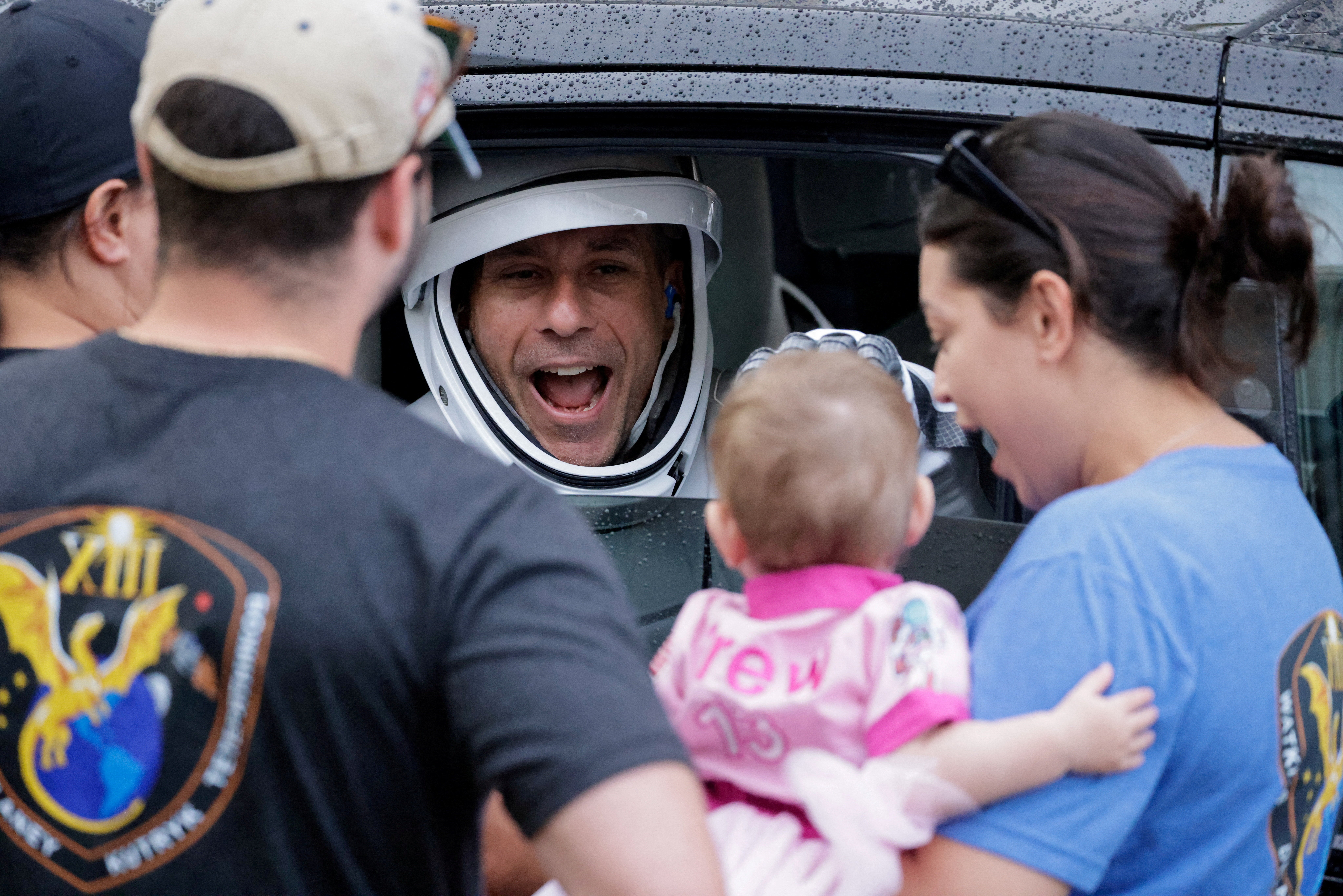 NASA astronaut Luke Delaney reacts to family members, as he departs for the launch pad at the Kennedy Space Center in Cape Canaveral, Florida, US, October 1, 2026