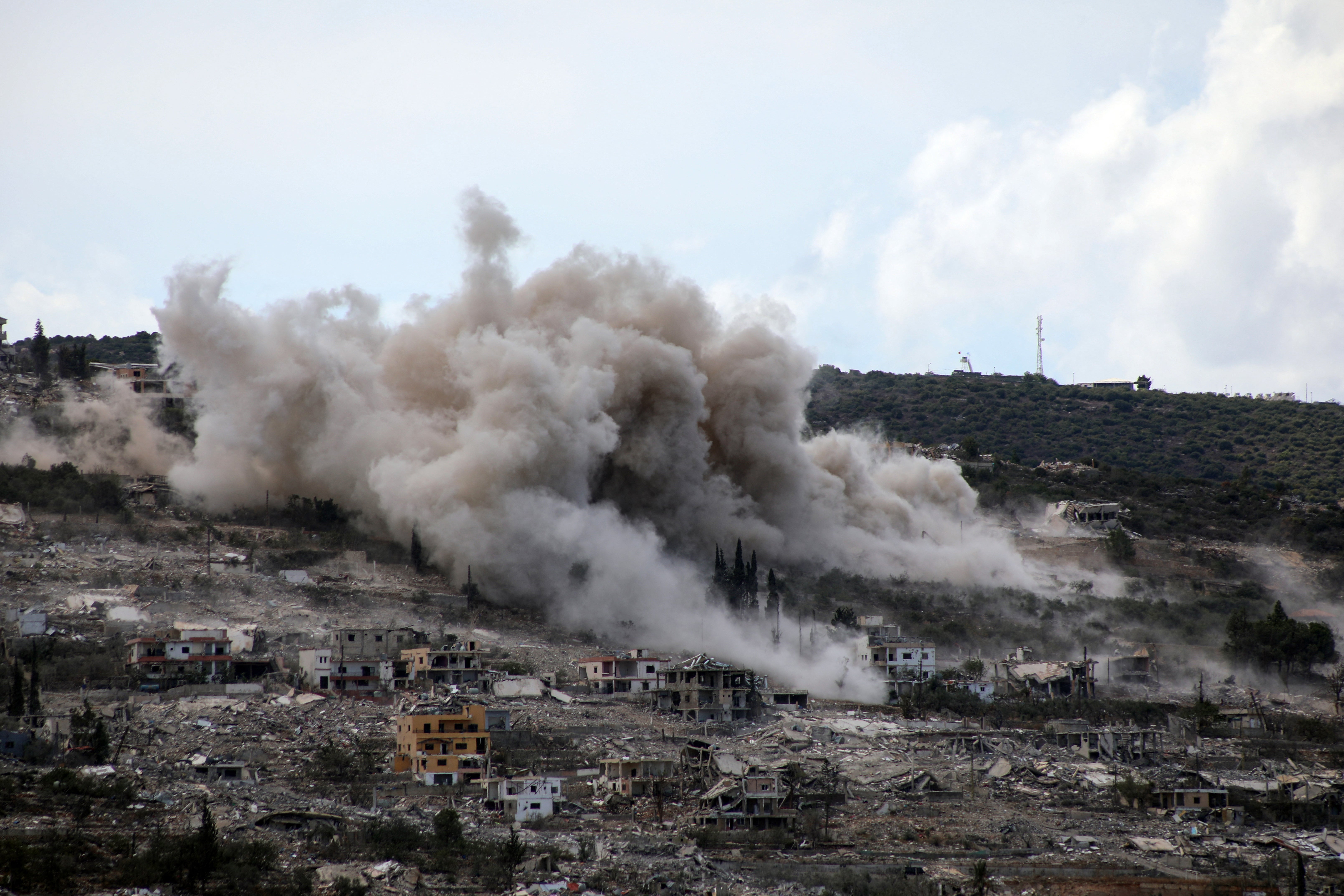 This picture taken from the southern Lebanese village of Hanniyeh shows smoke billowing from a site of an Israeli controlled explosion in the nearby village of al-Mansouri on October 1, 2026