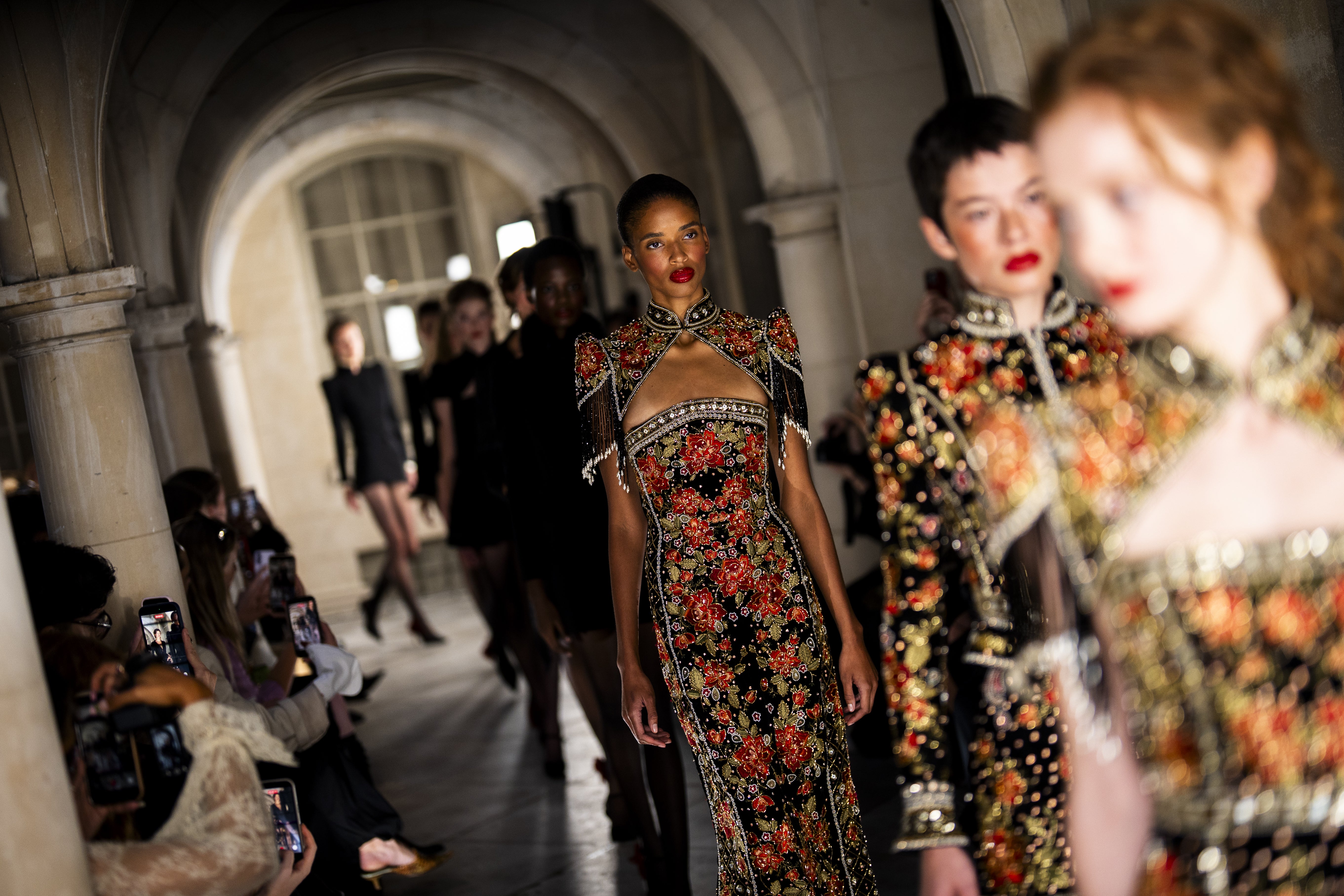 Red lips and soft blush dominated Annie’s runway in London (Jordan Pettitt/PA)