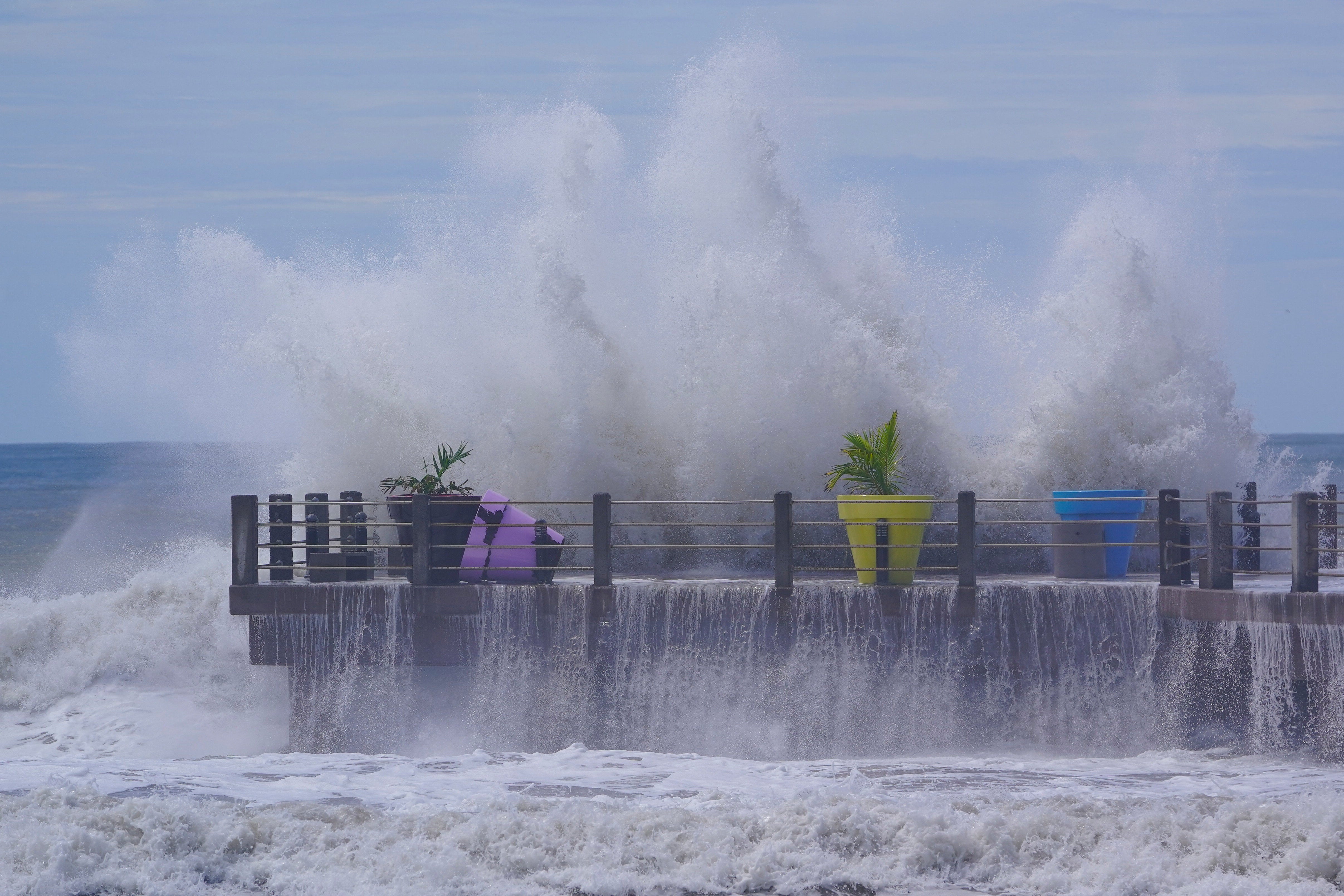 Waves crash along Matanchen beach as Hurricane Rachel churns off Mexico's Pacific coast.