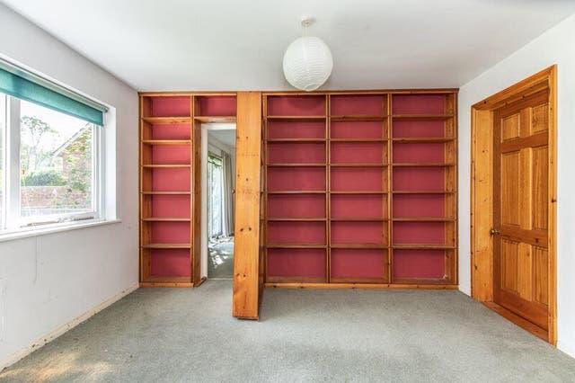 The house has a “mysterious secret door” hidden behind a bookcase