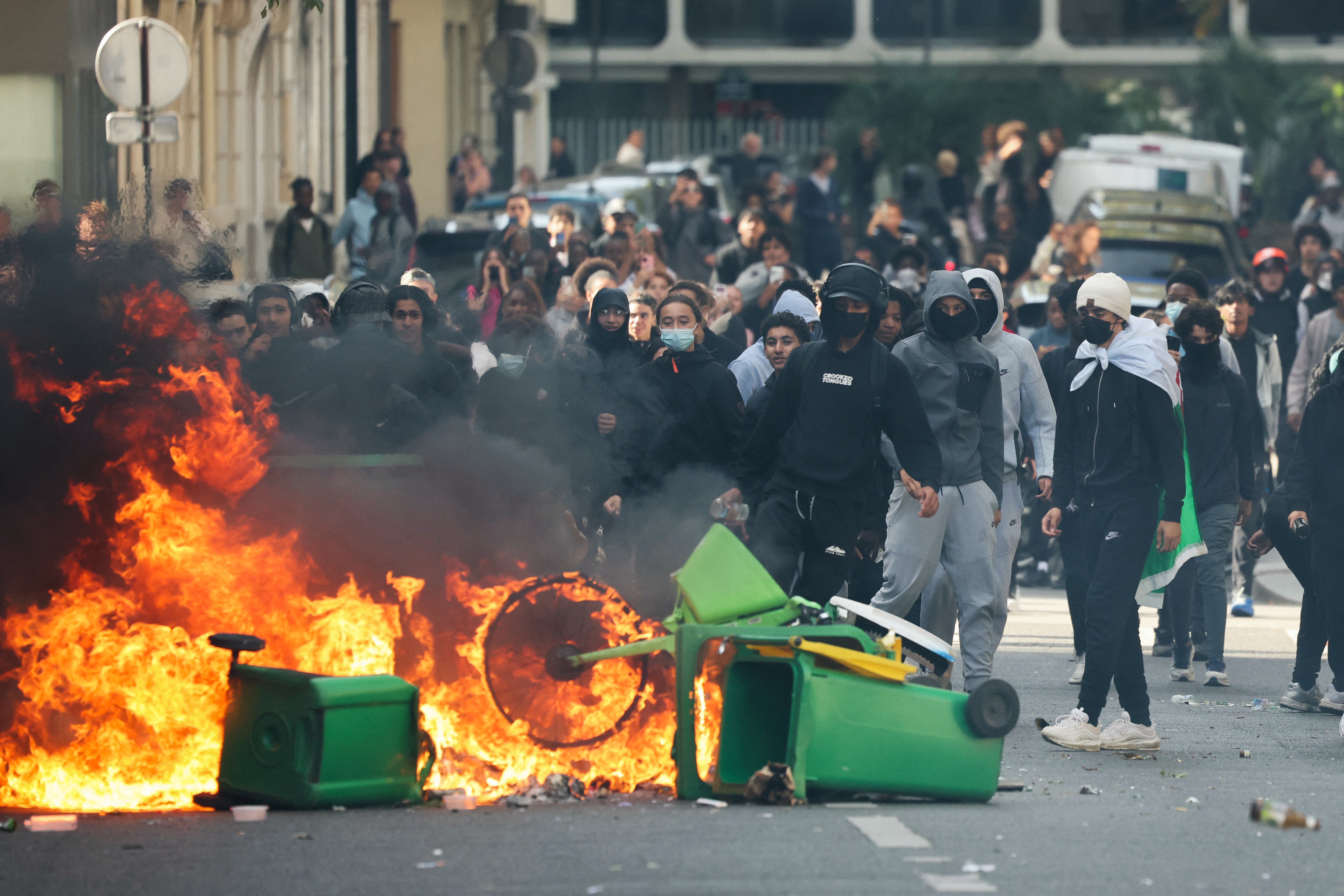 Fires burned in the streets near place de la Nation, in Paris on Friday