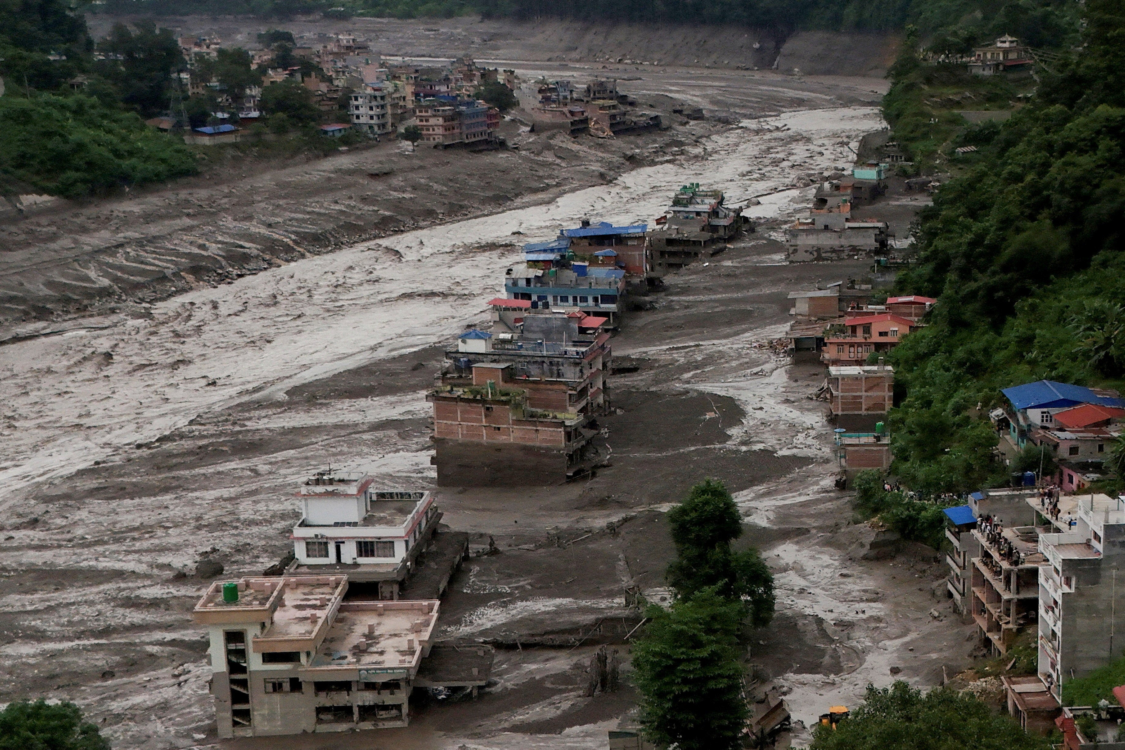 Nepal plans to drain four glacial lakes after deadly flash floods