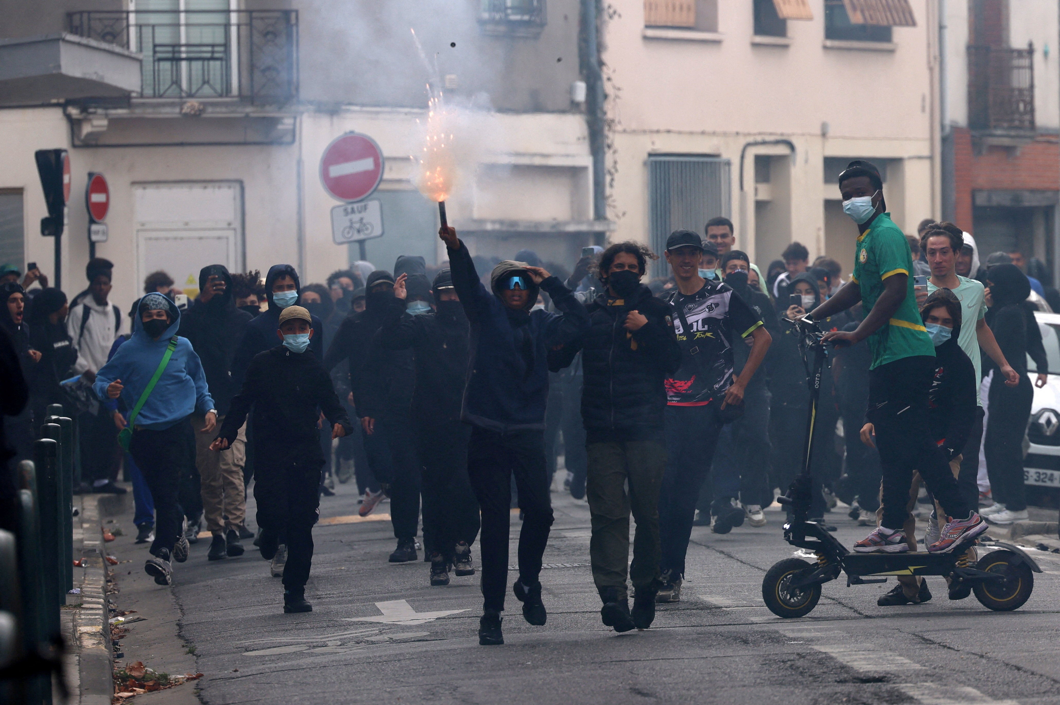 Masked high school near the Lycee Deodat-de-Severac high school in Toulouse (Reuters)