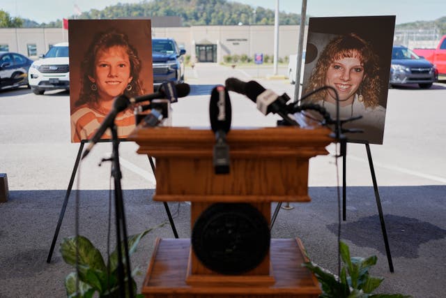 Photographs of Colleen Slemmer, who was murdered in 1995, are displayed outside Riverbend Maximum Security Institution before the planned execution of Christa Pike
