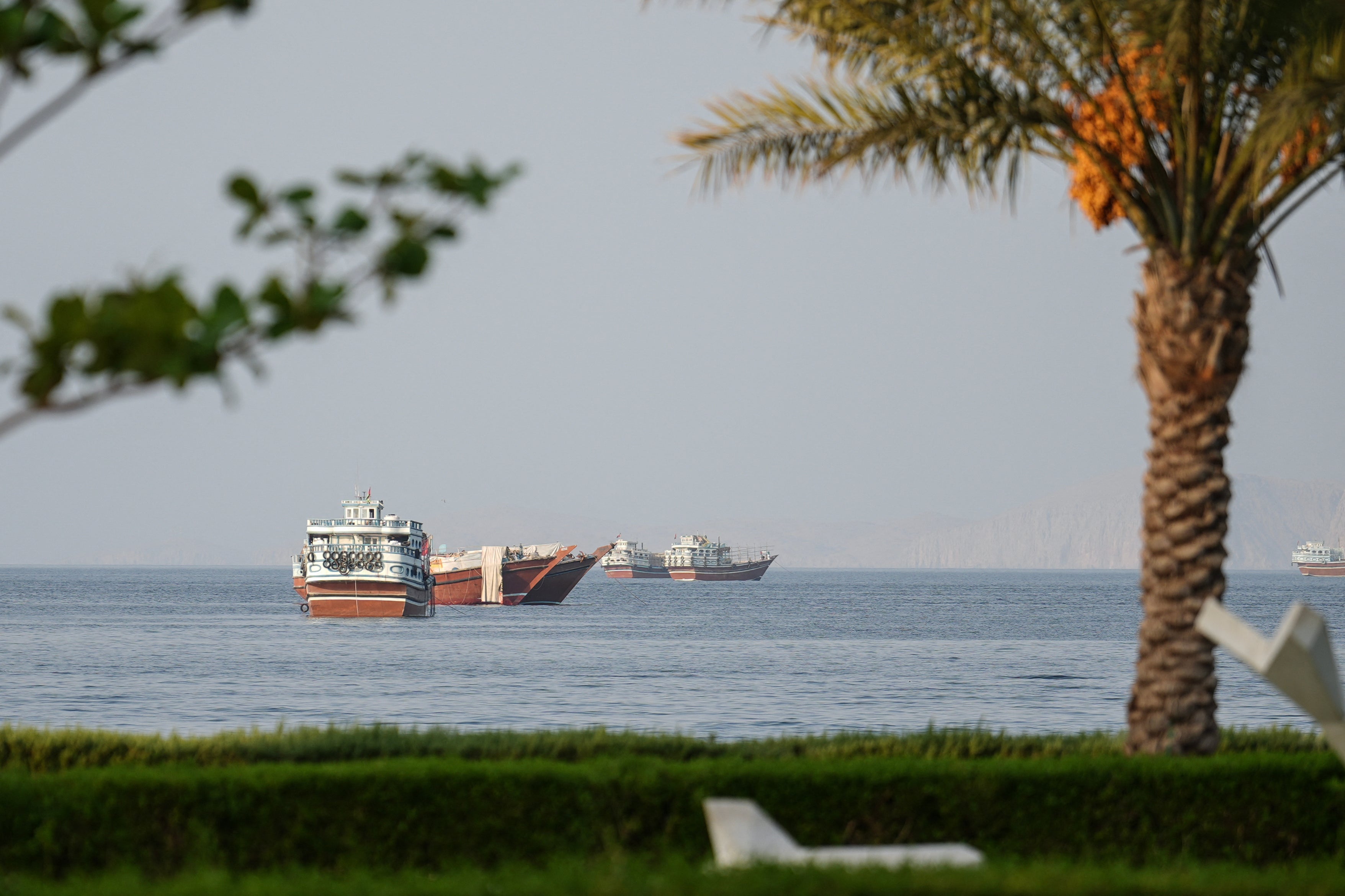 Ships are anchored off the coast of Khasab in Oman's Musandam Governorate, near the Strait of Hormuz, on October 2, 2026. (AFP/Getty)