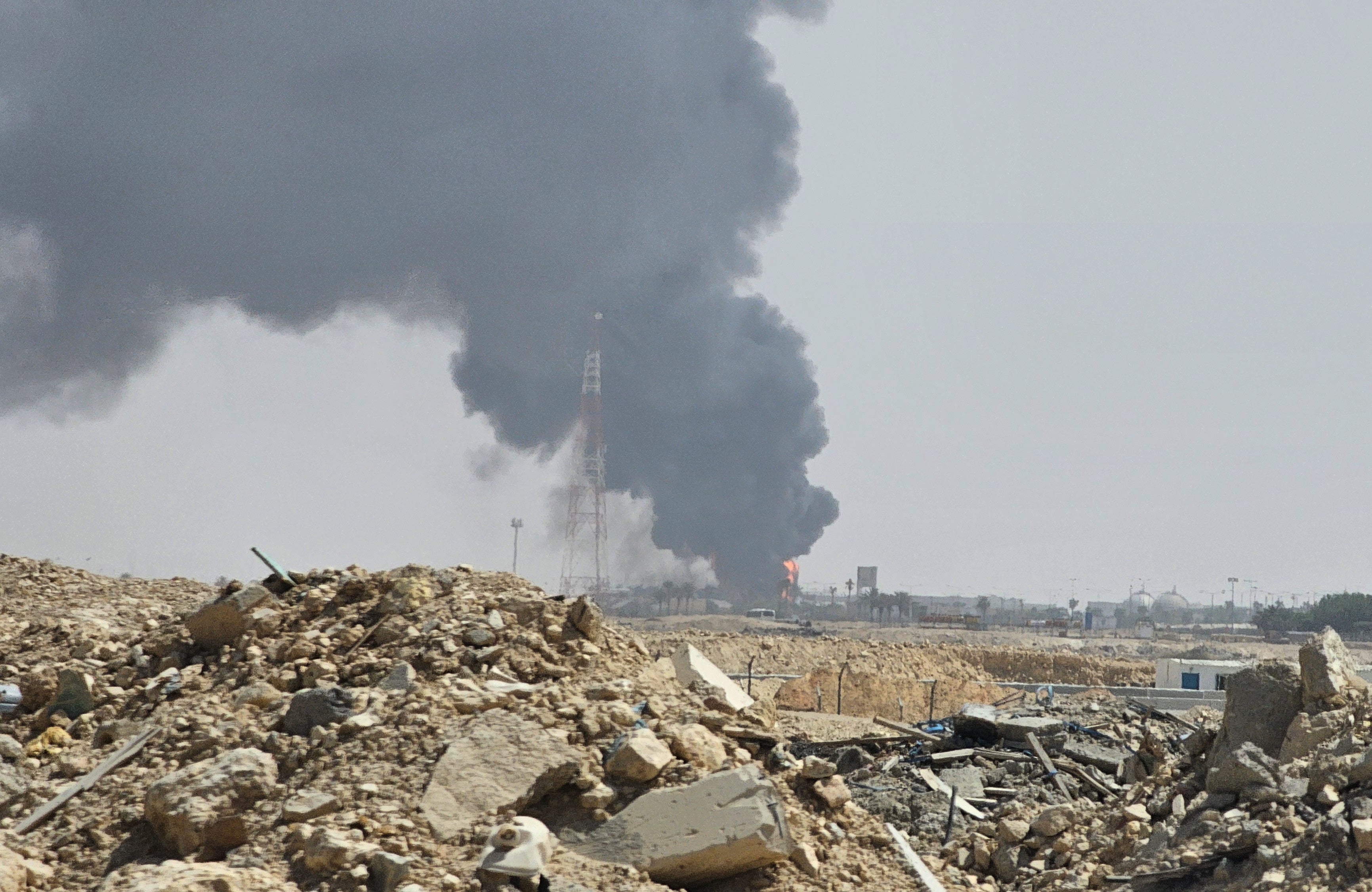Black smoke and flames rise from an oil facility in an industrial area in southern Riyadh, Saudi Arabia, Saturday, Oct. 3, 2026.