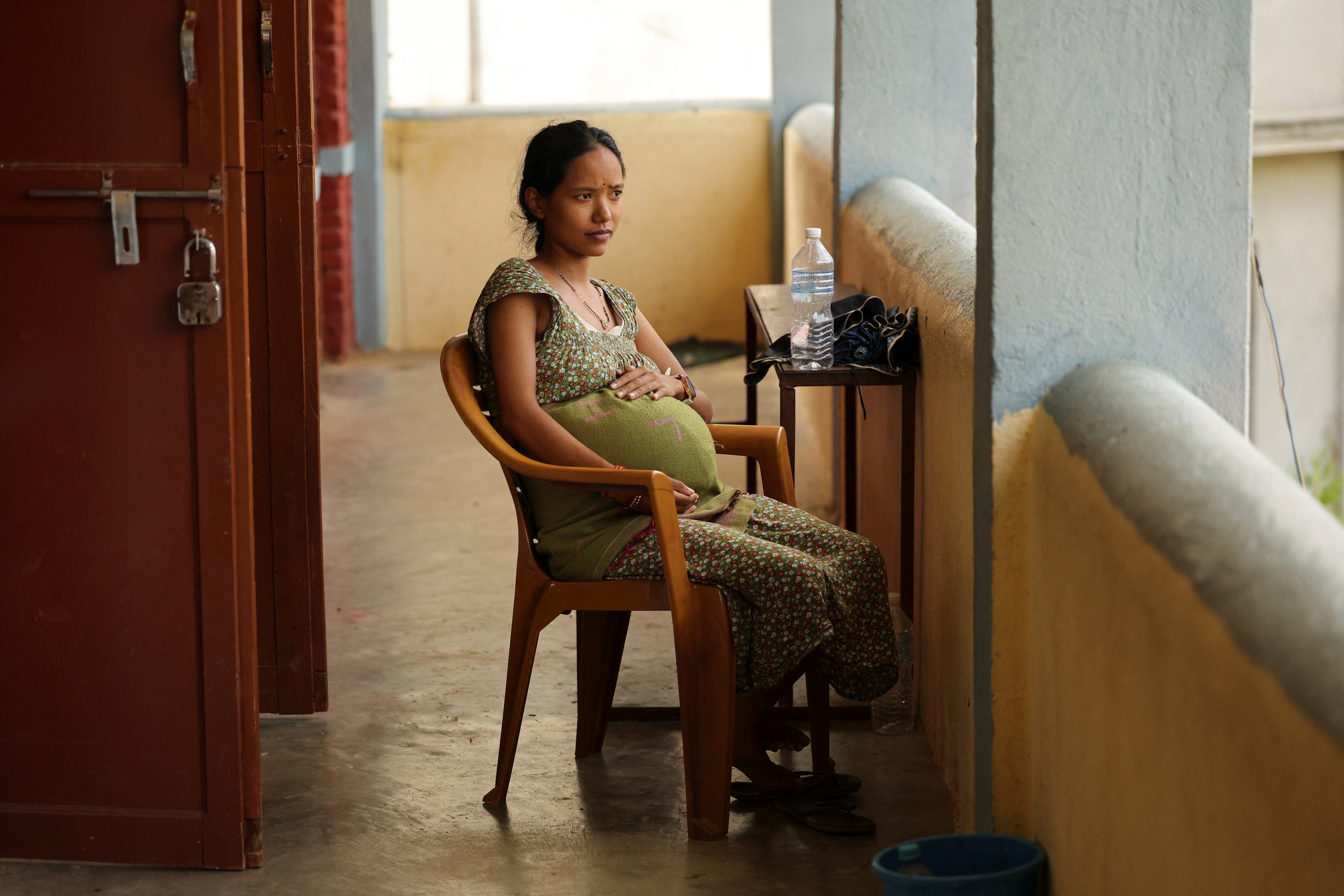 Pregnant women in hot countries are at increasing risk of complications. Pictured is Anjana Shrestha (25), a pregnant woman carrying twins, following the deadly flash floods in Nepal this year