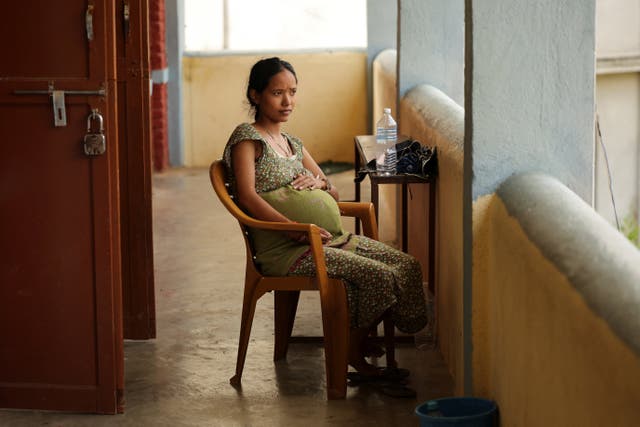 Pregnant women in hot countries are at increasing risk of complications. Pictured is Anjana Shrestha (25), a pregnant woman carrying twins, following the deadly flash floods in Nepal this year