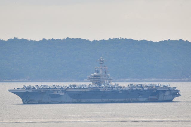 The USS George H.W. Bush arrives near Phuket Deep Sea Port before docking for a rest stop following a long deployment in the Middle East, in Phuket, Thailand, October 4, 2026.