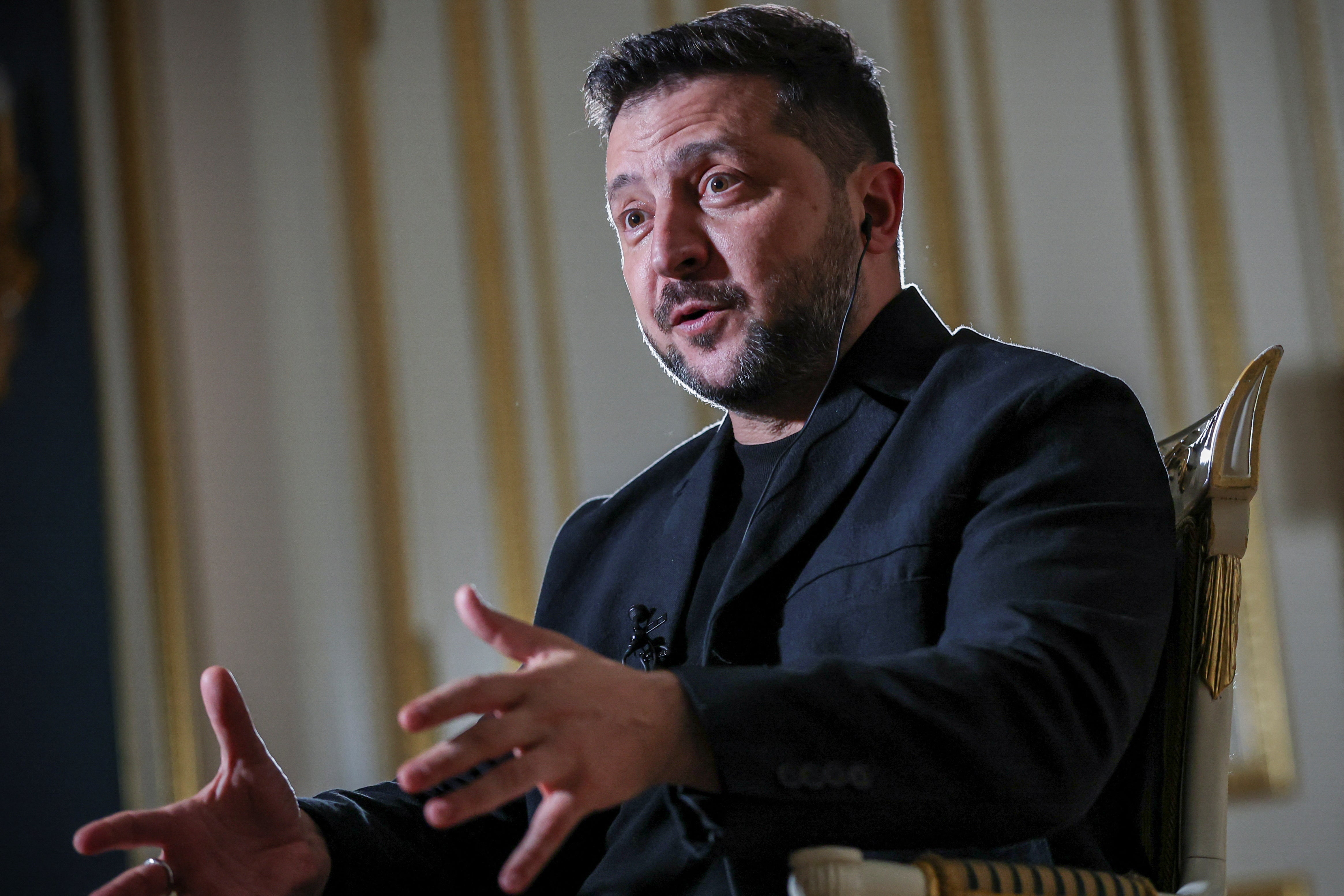 Ukraine's President Volodymyr Zelenskiy speaks during an interview with Reuters