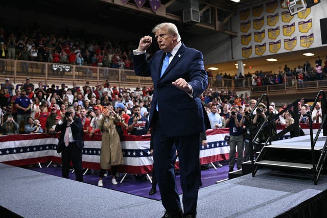 President Donald Trump dances during a campaign rally in Vandalia, Ohio