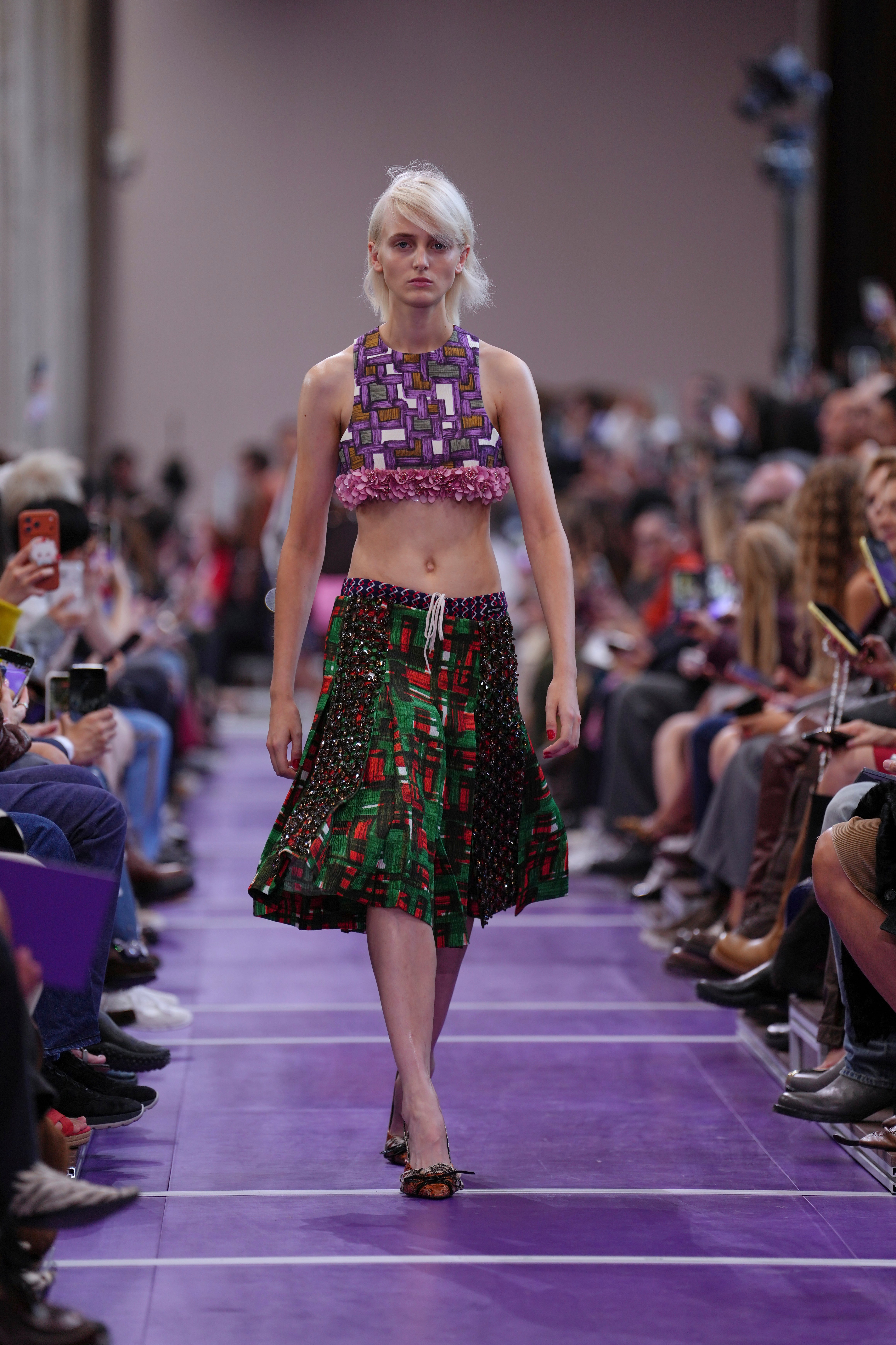 Models walked with windswept hair and clashing prints (Aurelien Morissard/AP)