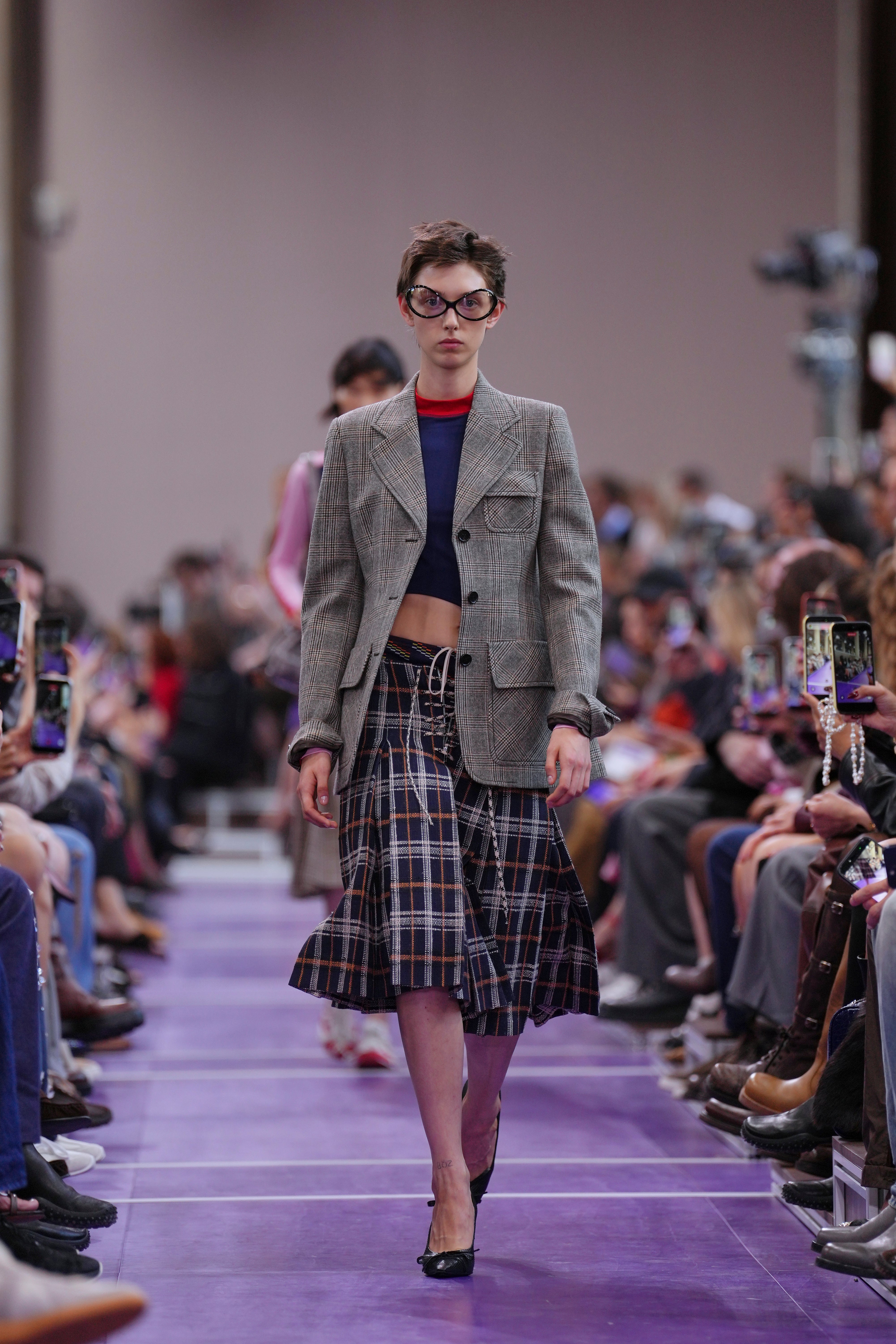 Check and tartan was a key motif (Aurelien Morissard/AP)