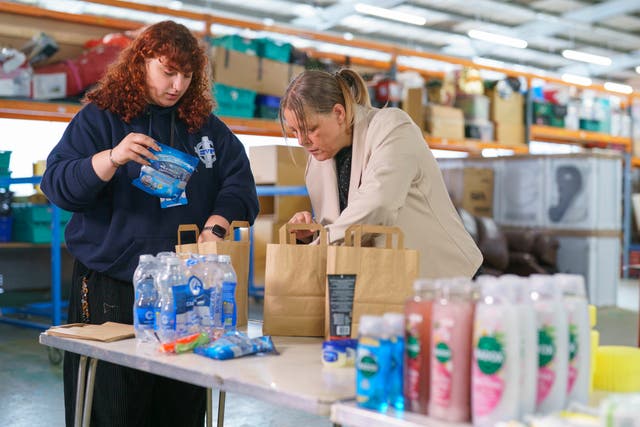 Volunteers pack hygiene products at St Vincent's in Bradford ahead of National Hygiene Week