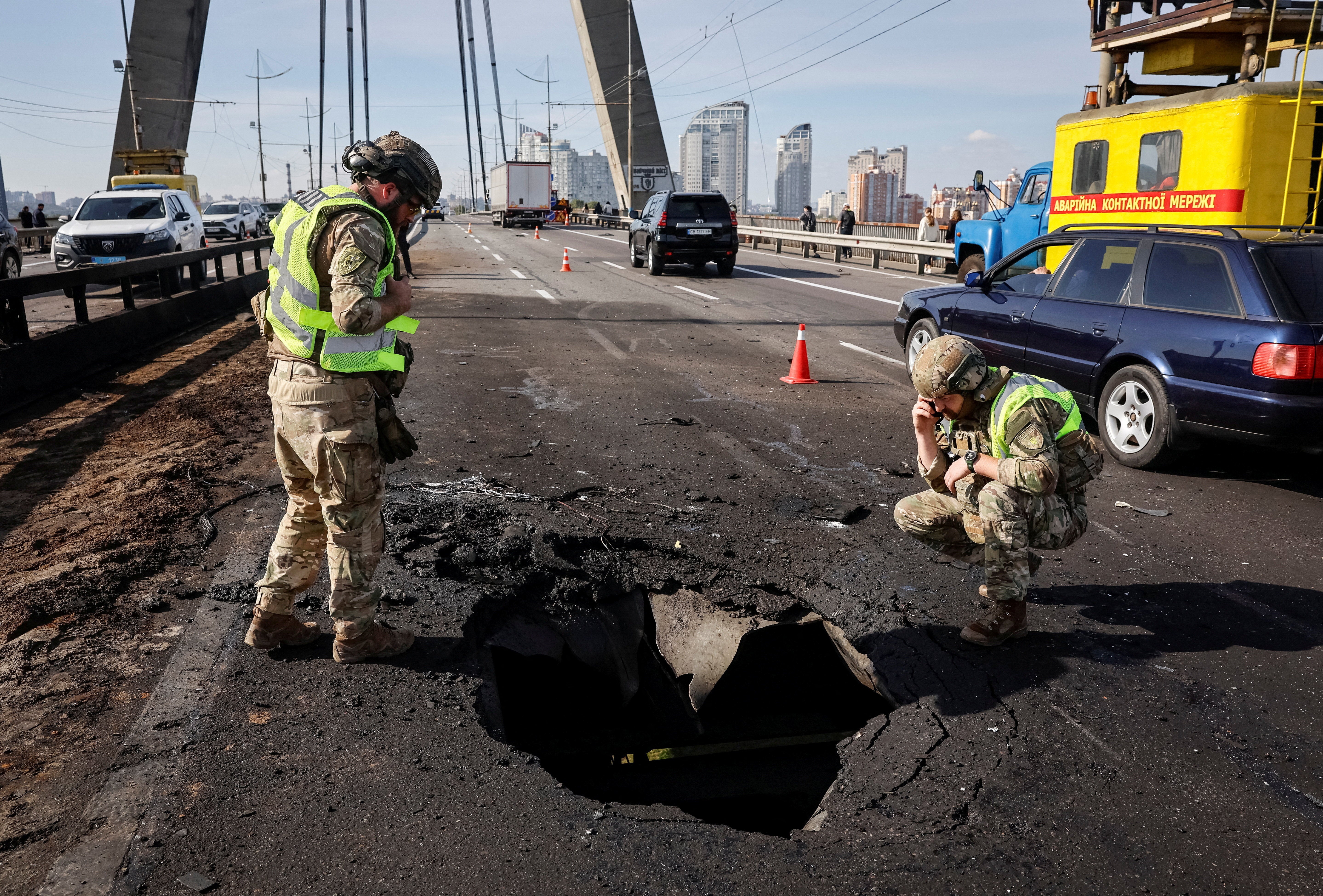 Ukraine latest: Kyiv bridge hit in Russian air strike as Moscow vows retaliation