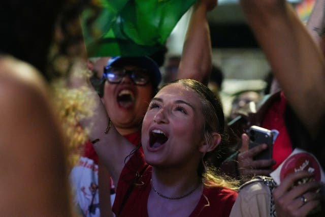 Supporters of Brazilian President Luiz Inacio Lula da Silva, the Workers' Party (PT) candidate for presidential re-election, react as they wait for results at Paulista Avenue in Sao Paulo, Brazil October 4, 2026. REUTERS/Alexandre Meneghini