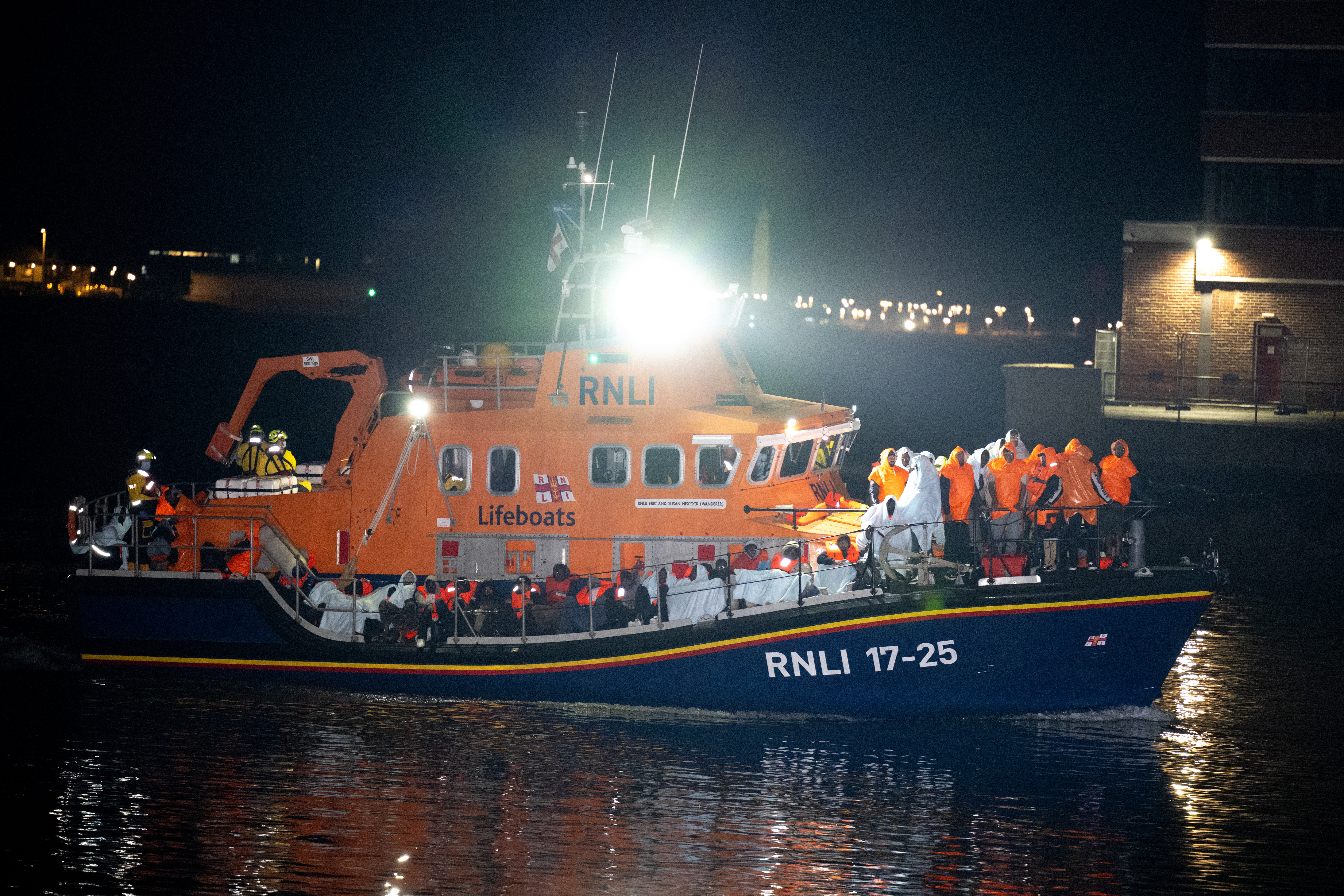 The dinghy was being shadowed by French rescue vessels until it was met by the RNLI boats in English waters, according to ship tracking data