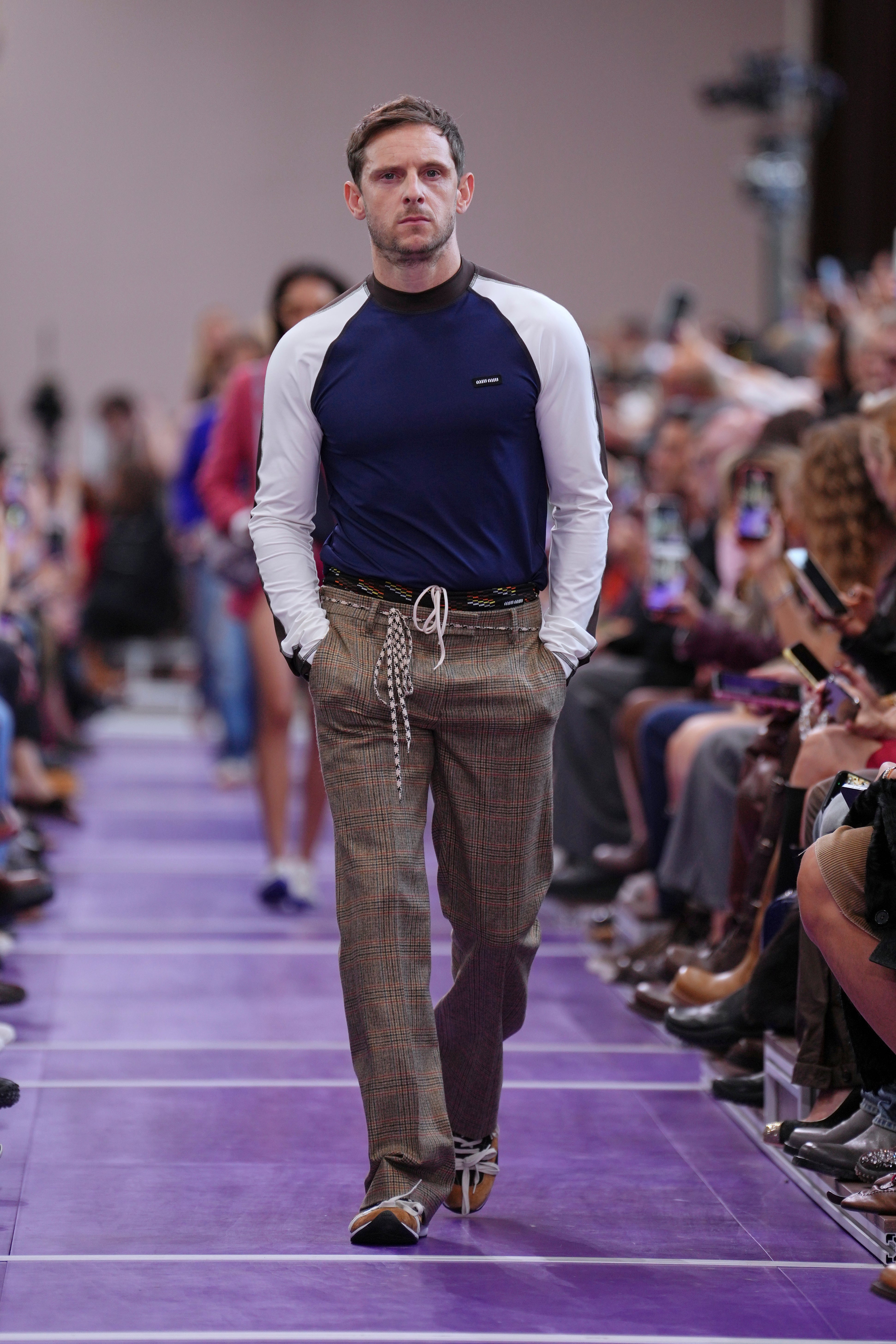 Jamie Bell walks the runway