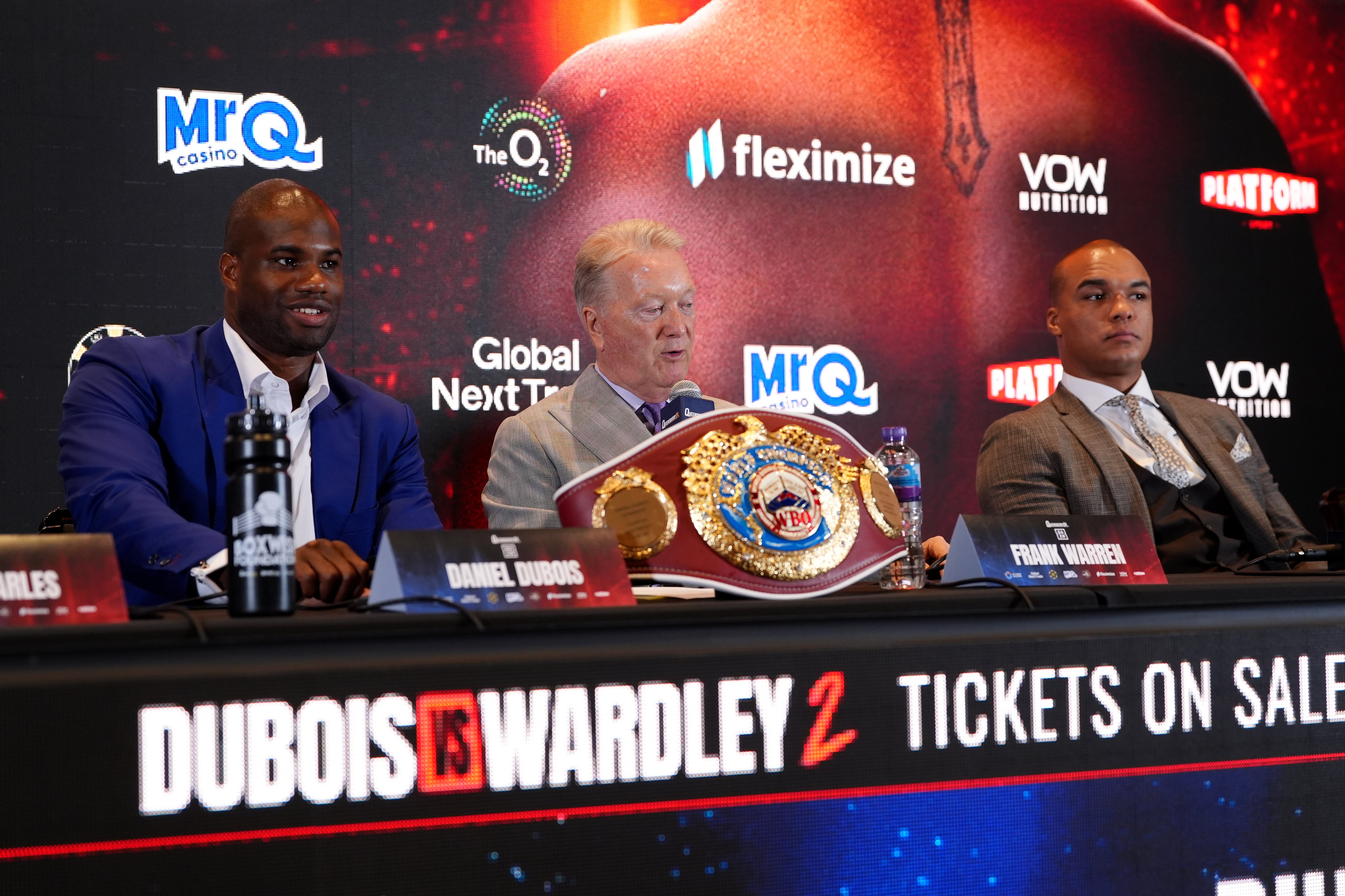 Daniel Dubois, Frank Warren (centre) and Fabio Wardley (right) during a press conference last month (PA)