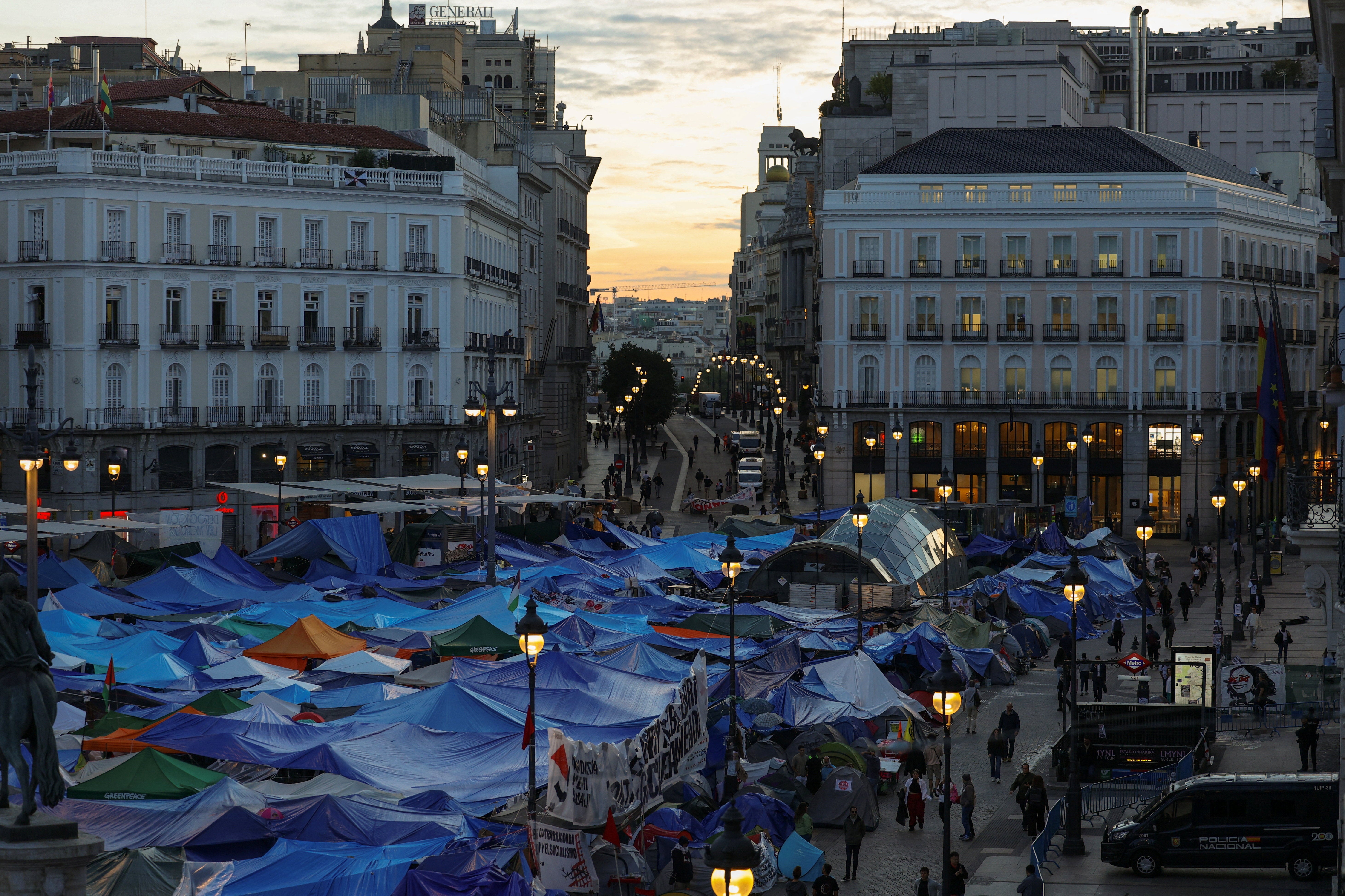 Protesters camp in Puerta del Sol, where they are demanding political measures to stop evictions and address the housing crisis, following the eviction of an 87-year-old woman from her home
