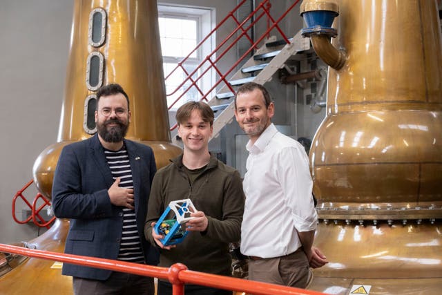 (Left to right) Dr Gilles Bailet of the University of Glasgow’s James Watt School of Engineering, University of Glasgow engineering student Micah Chapman and Geoff Nisbet of Allen Associates examine prototype space equipment at Glengoyne Distillery, Dumgoyne