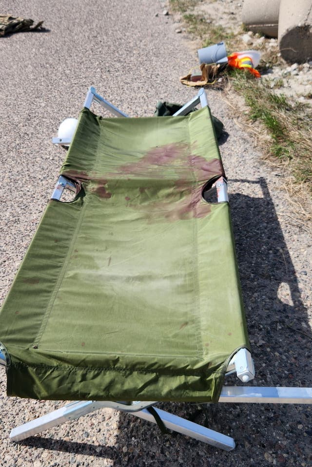 Blood stains a stretcher at Port Shuaiba in Kuwait on March 1