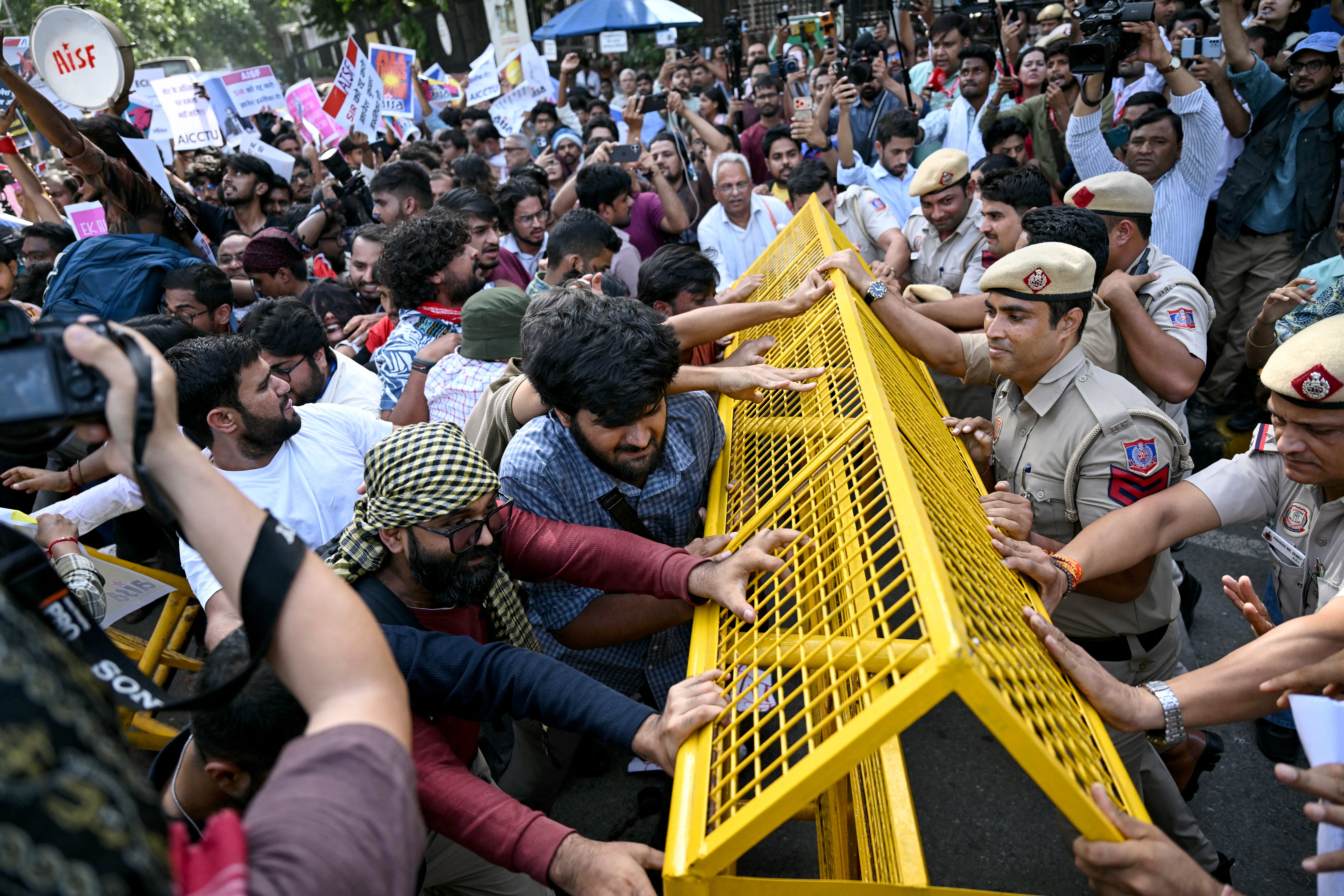 Protesters scuffle with police during the demonstration