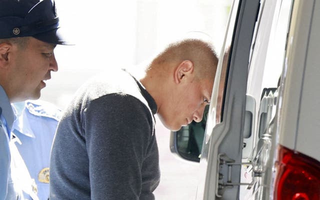 Ballard, pictured leaving a police station, denies the allegations