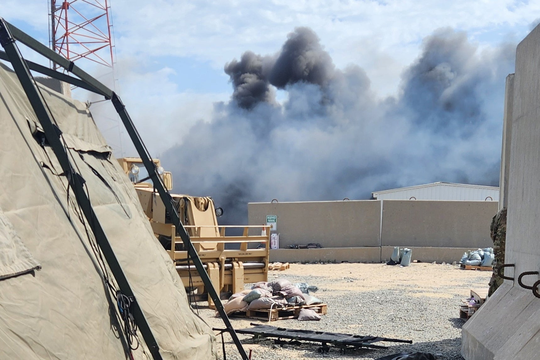 Smoke rises from an Iranian drone strike at Port Shuaiba in Kuwait on March 1