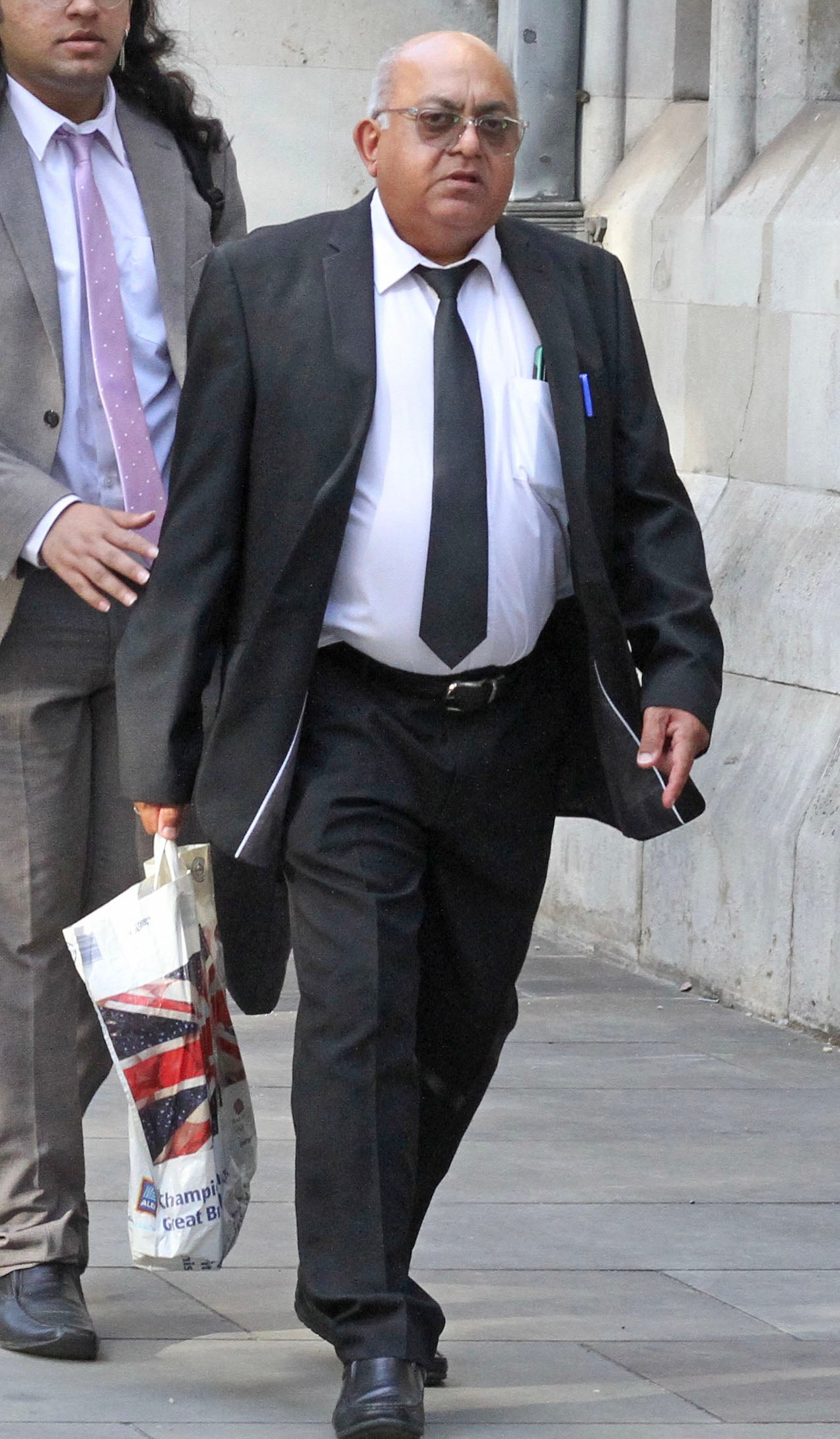 Harish Verma outside Central London County Court after hearing in will row with brother Bani