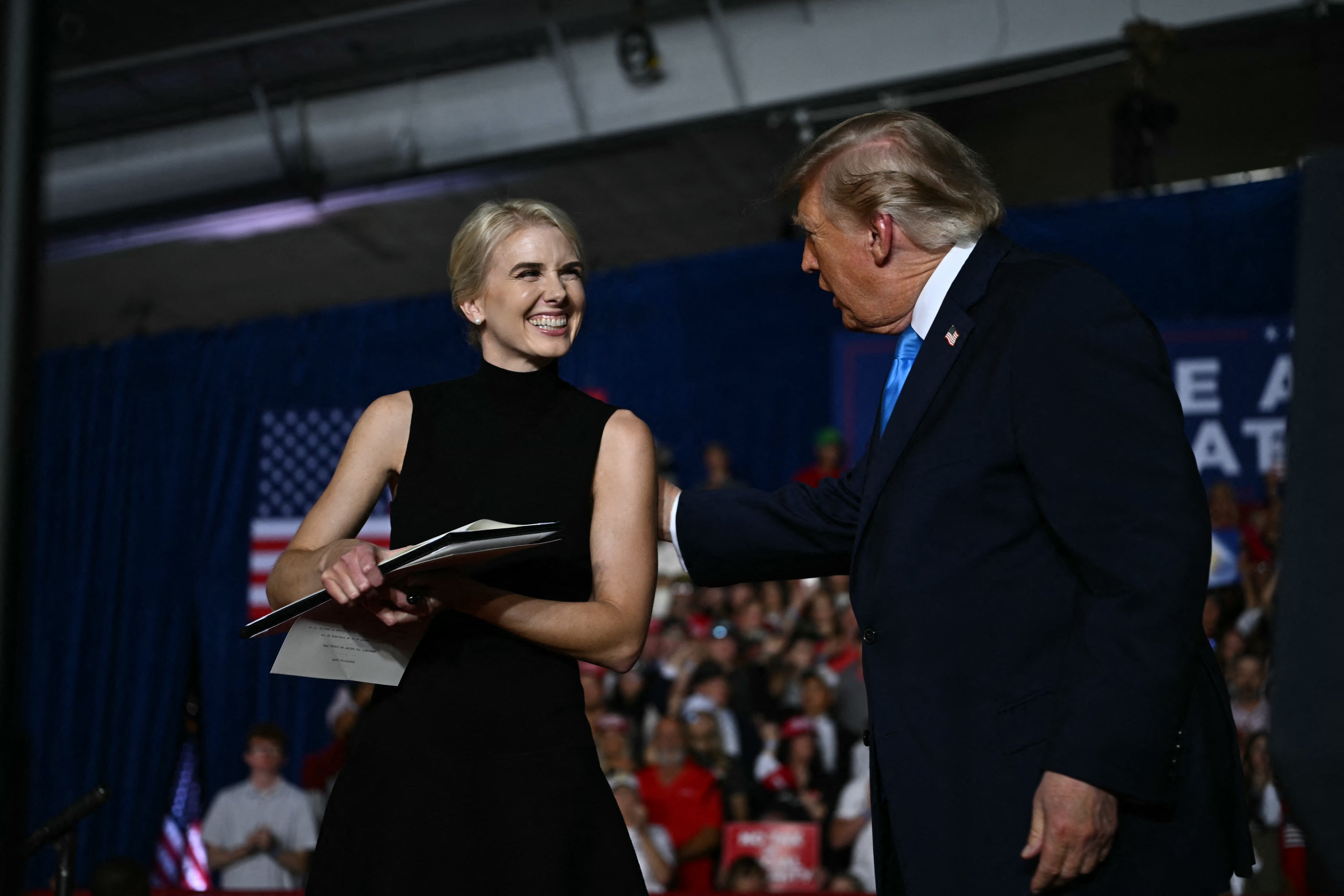 President Donald Trump has brought his close aide, Natalie Harp, on stage at a rally to sign an executive order in a desperate attempt to reduce diesel costs ahead of the crucial midterm elections