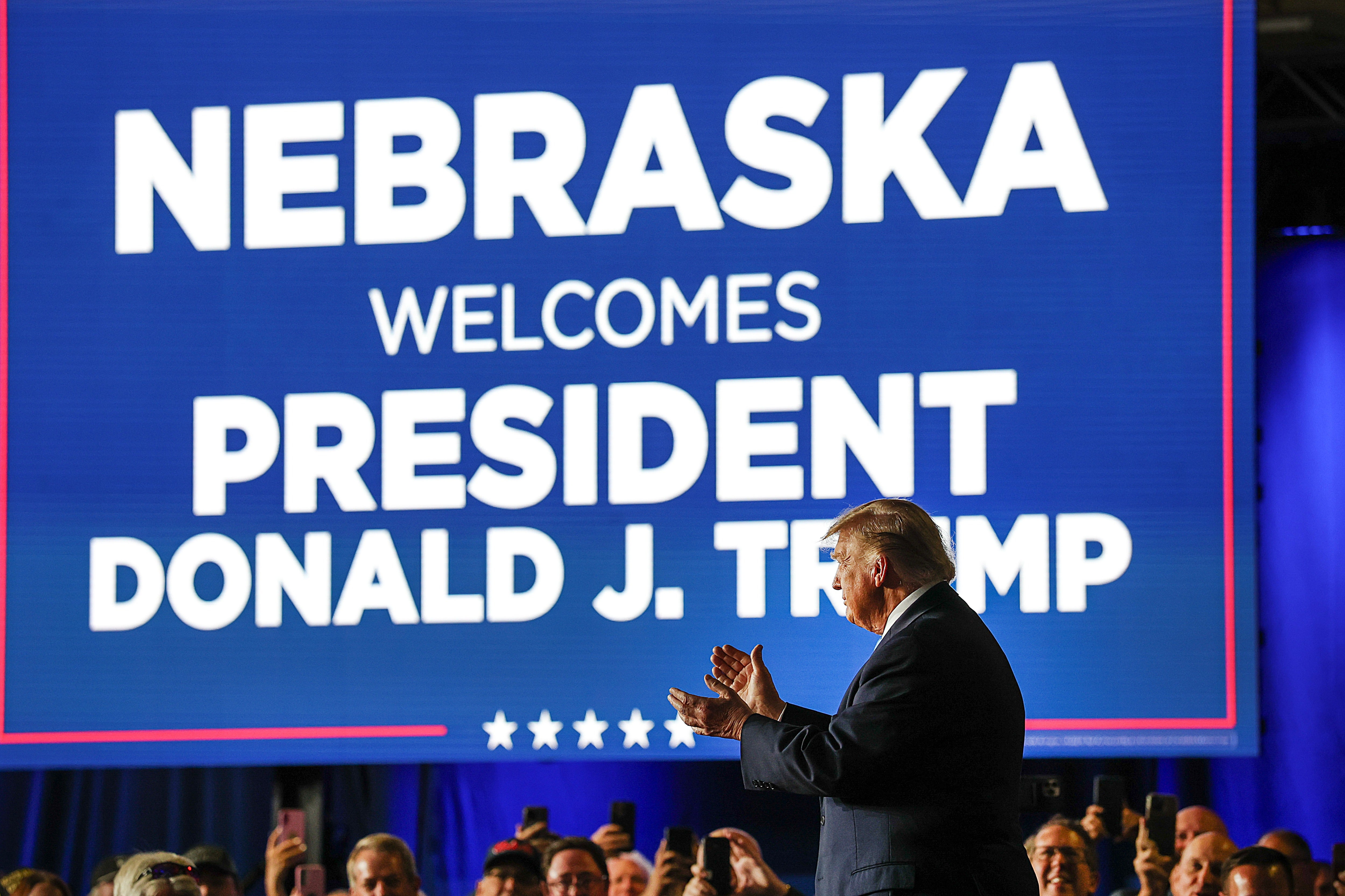 ‘They've tried to smear us, to slander us, to persecute us, and demoralize us,’ Trump said about the media while visiting the Nebraska State Fairgrounds in Grand Island Monday night