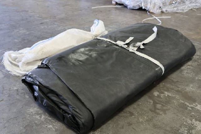 Inflatable boats due to be used by cross-Channel people smugglers which have been seized at East Midlands Airport